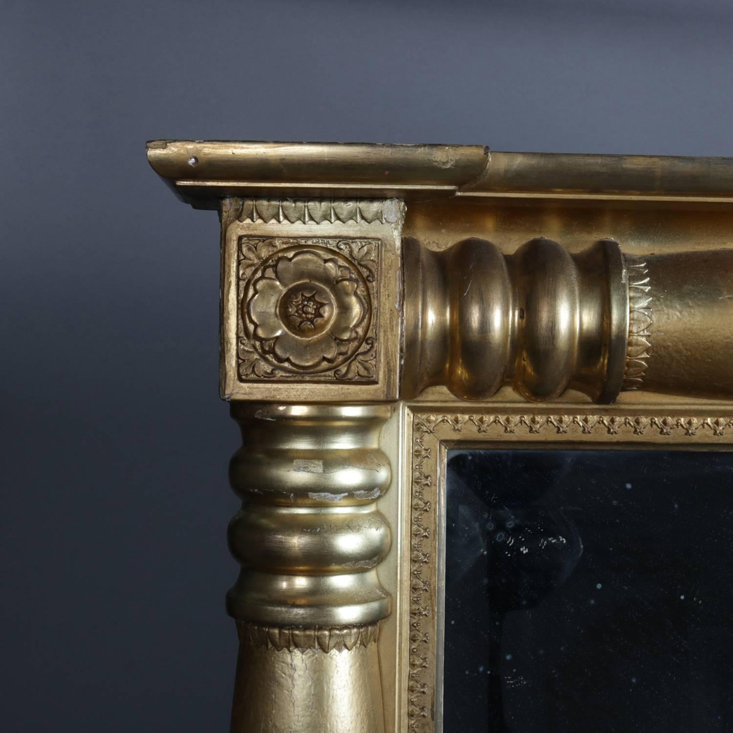 Antique American Empire triptych over mantel mirror feature gold gilt frame with columns and carved floral die joints, 19th century

***DELIVERY NOTICE – Due to COVID-19 we are employing NO-CONTACT PRACTICES in the transfer of purchased items. 
