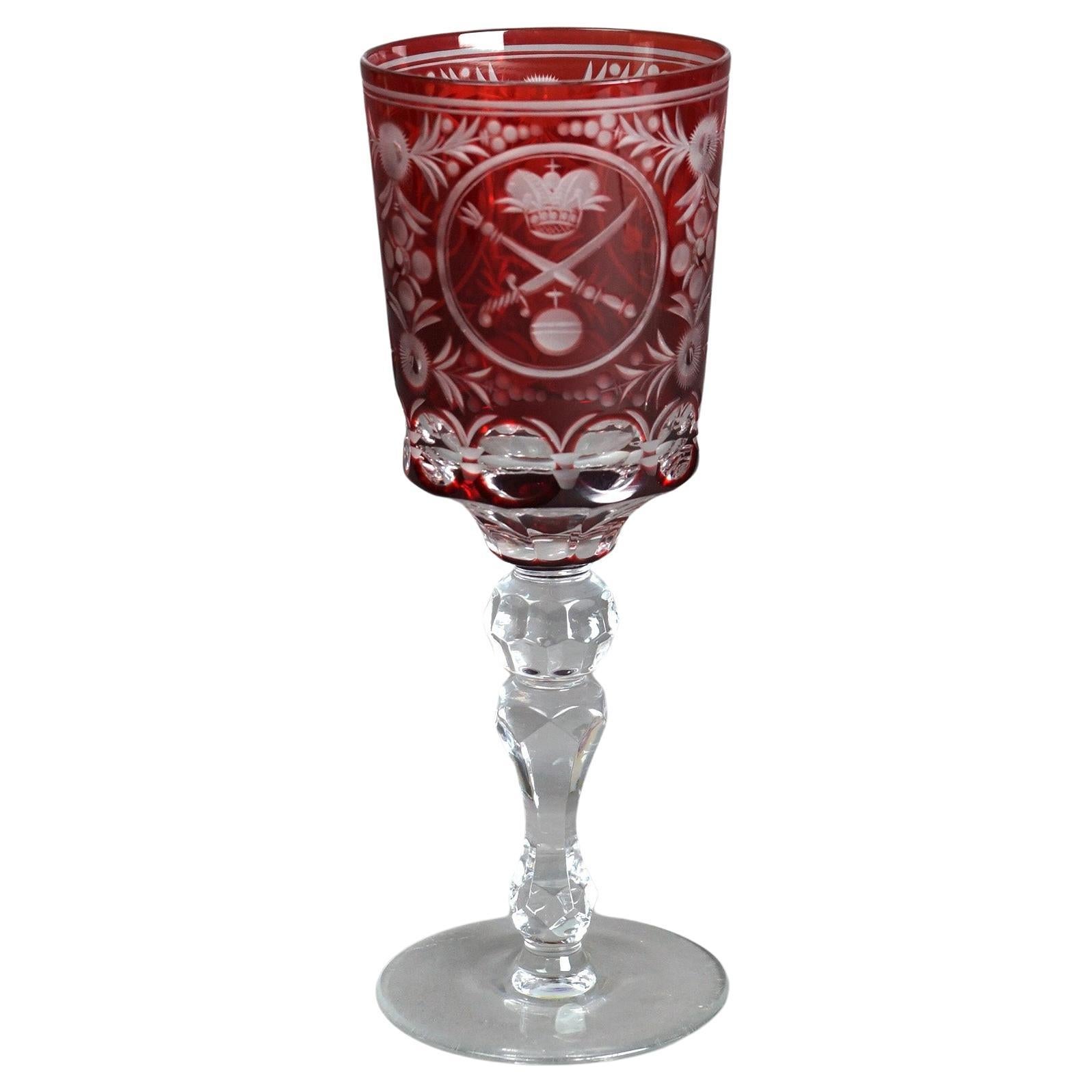 Antique Russian Imperial Czar Nicholas II Cranberry Cut to Clear Crystal Challis with Double Headed Eagle, Crossed Swords and Foliate Elements, C1910

Measures - 9.25
