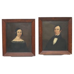 Paire d'anciens portraits d'homme et de femme à l'huile sur carton, encadrés, vers 1840