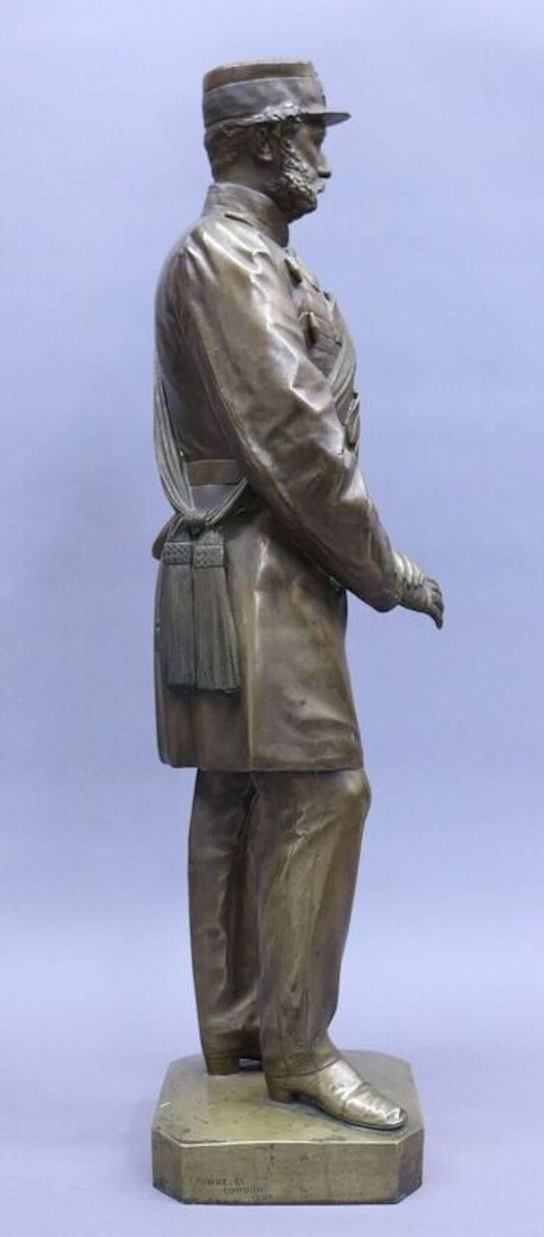 Thomas Fowke 1865 Civil War Era monumental bronze figure features life-like detail. Inscription along base reads "This monumental bronze statue was presented to Captain John P. Field, H.A.C. after his participation in the volunteer movement of