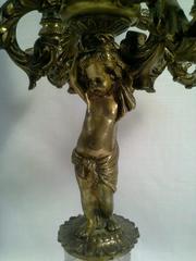 Pair of Bronze and Crystal Four-Light Cherub Candelabras, Late 19th Century