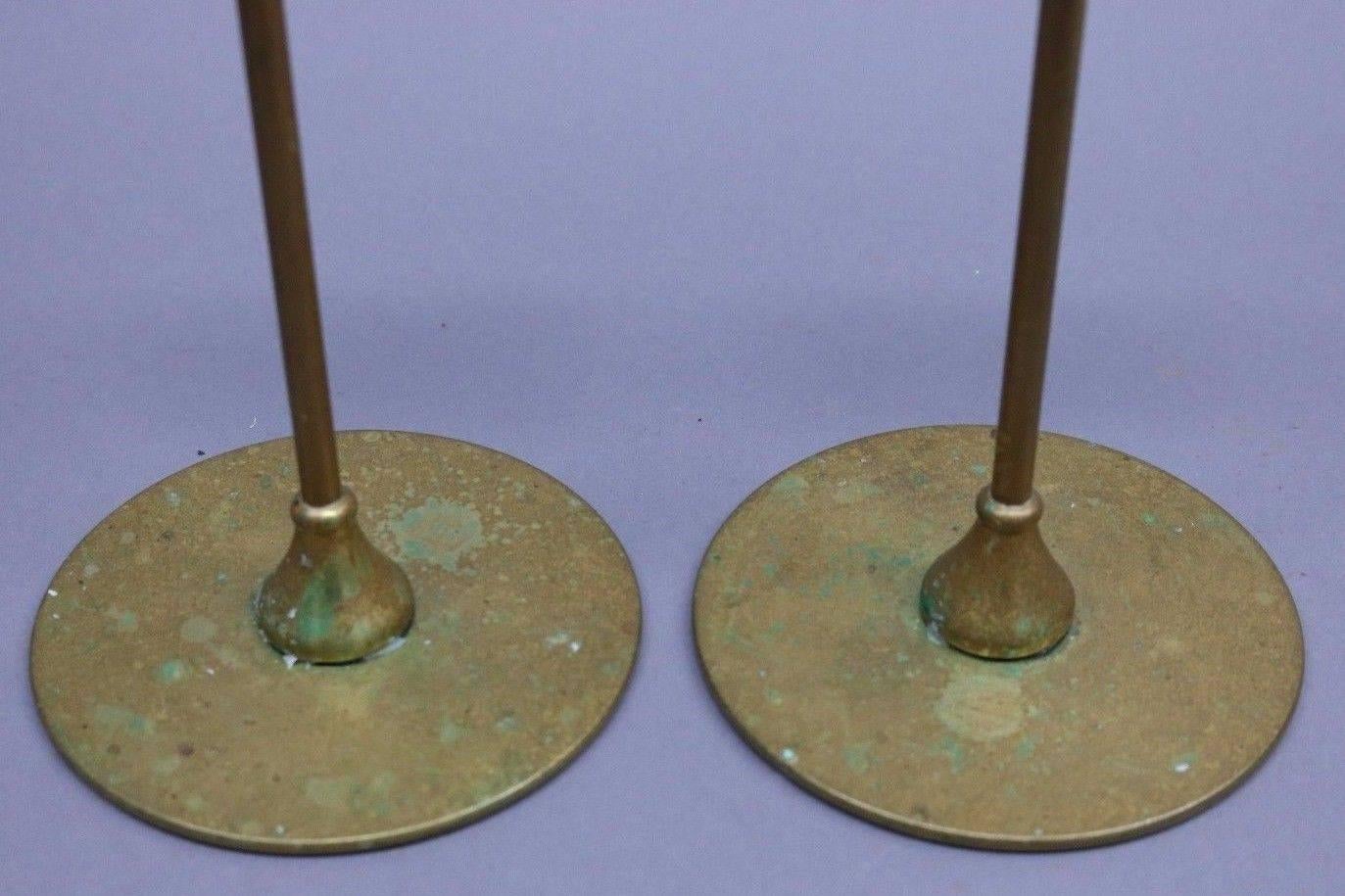 Antique Arts & Crafts Jarvie candlesticks feature the traditional clean, simple lines of the movement, circa 1910. Robert R. Jarvie "the Candlestick Maker," created some of the most sophisticated metal candlesticks of the Arts &