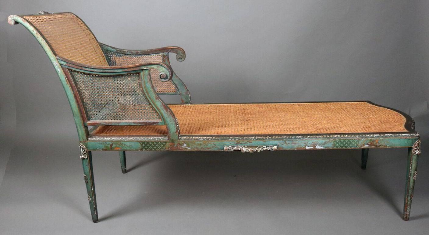 19th century French Venetian continental form Recamier, lounge chair, features hand-painted floral accents on original blue-green painted frame with applied carved shell mounts and caned seat and back.
 