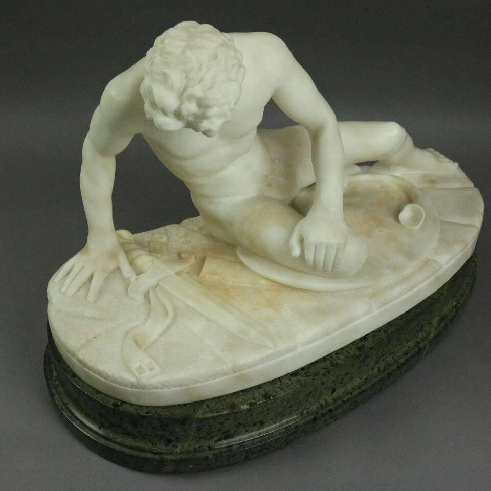 Antique Classical Italian hand-carved alabaster sculpture after "The Dying Glaul" possibly by Epigonus, a court sculptor of the Attalid dynasty of Pergamon, seated on a green marble base, circa 1870.

Measures: 14.4"H x 21"W x