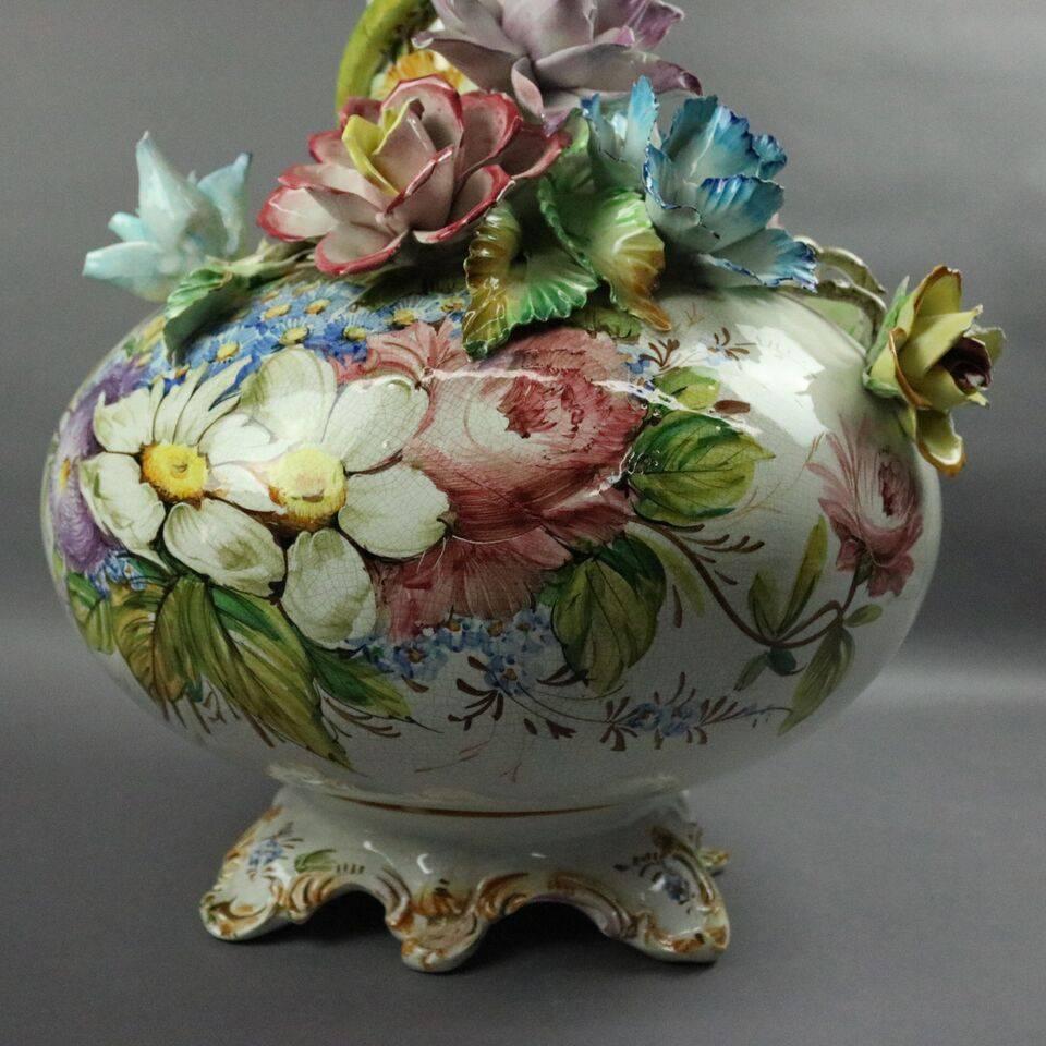 Monumental antique Italian Capodimonte porcelain floor vase features hand-painted foliate motif with applied floral and stylized serpent coiled around the vase neck and emerging at the vase mouth, atop footed base with hand scripted "Carpie