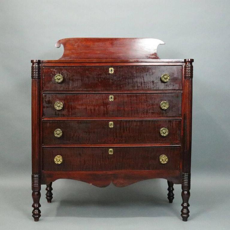 Antique Cherry And Tiger Maple With Bronze Federal Style Four Drawer Antique Federal Style Chest Features Cherry And Tiger Maple Construction Including Turned Legs Quarter Columns