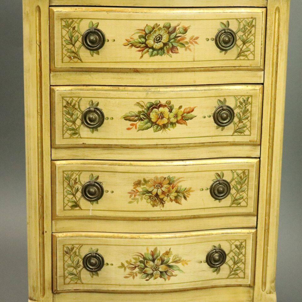 Vintage pair of French Provincial style stands feature floral and foliate decoration with gold highlights, four serpentine drawers, cabriole legs, and protective glass top, circa 1950.

Measures- 30