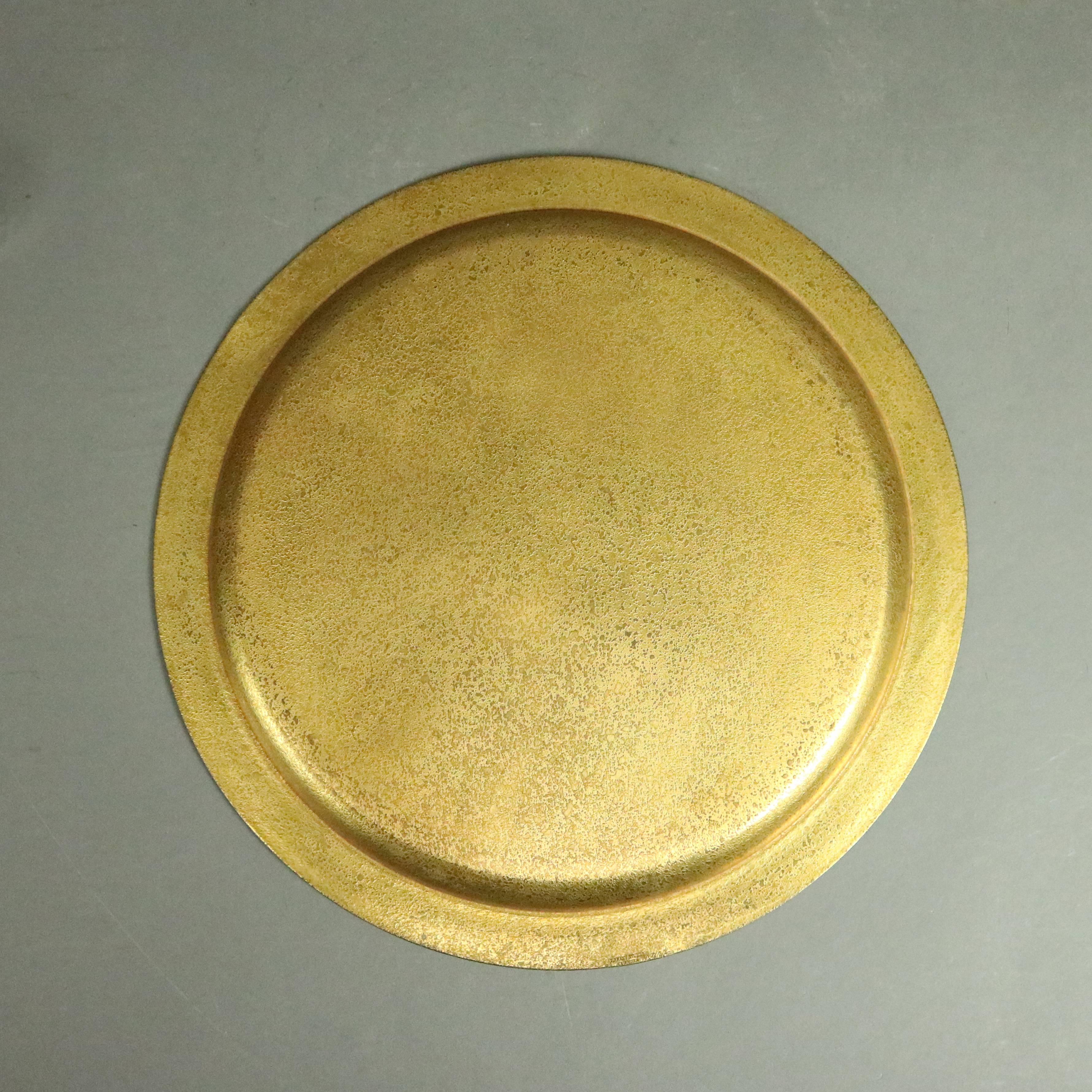 Antique gilt bronze doré charger or tray en verso bears Tiffany Studios New York 1722, circa 1925

Measures - 13.75"diam (10.75 diam plate inset) x .75" H.