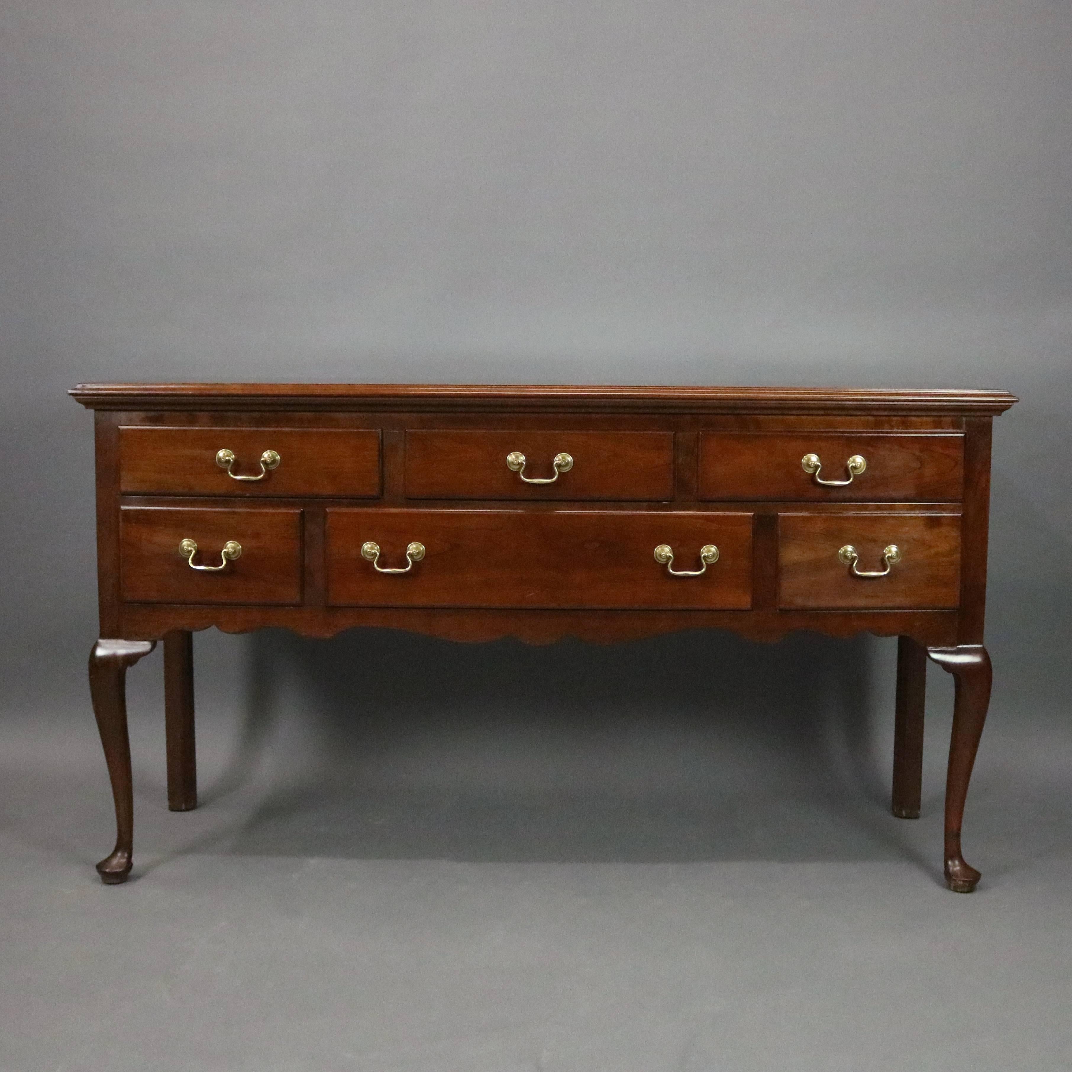 Vintage L. & J.G Stickley Cherry Valley collection server features solid cherry construction with six drawer case atop Queen Anne style legs, Stickley stamp on drawer interior, original paperwork, circa 1985.

Measures: 34.5" H x
