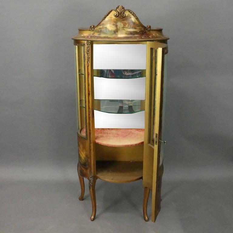 Antique Louis XIV Vernis Martin vitrine features hand-painted scenes including countryside scene with lady and cherub central on apron with flanking landscape scenes, floral bordering, and landscape scene on crest, floral and foliate ormolu, curved