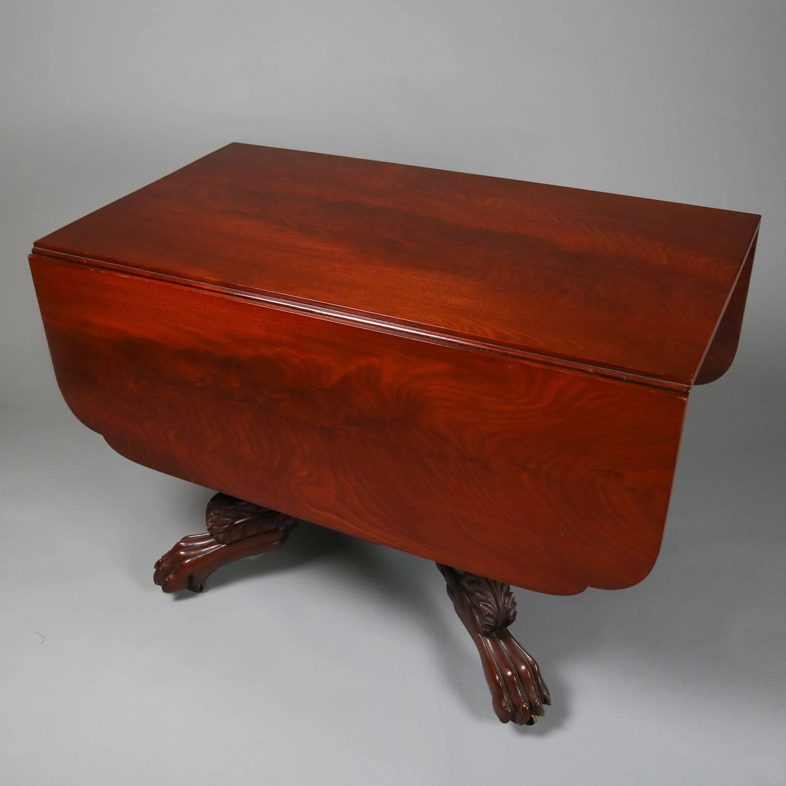 Antique Carved American Empire Flame Mahogany Pedestal Drop-Leaf Table In Good Condition In Big Flats, NY