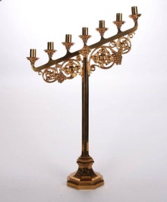 Pair of Gilt Gothic Style Seven-Light Candelabra with Grape and Leaf Motif