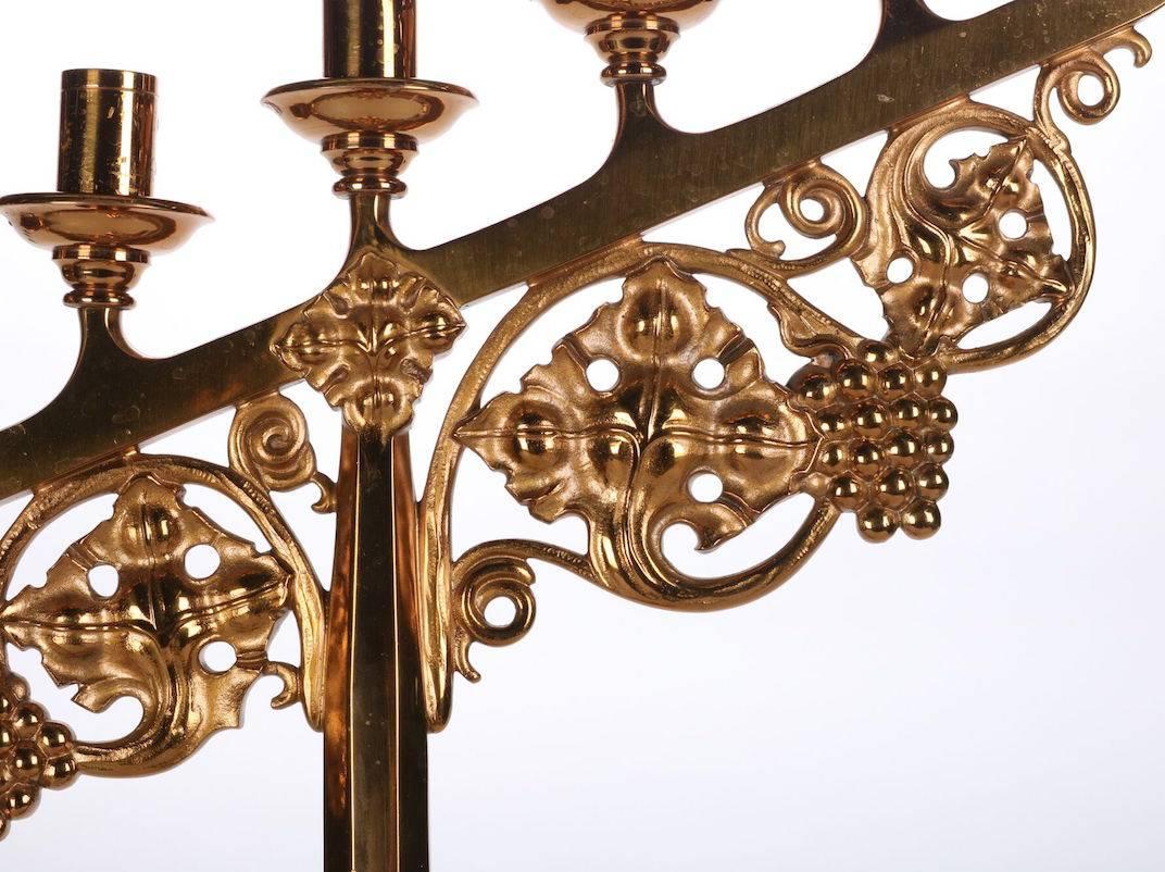 20th Century Pair of Gilt Gothic Style Seven-Light Candelabra with Grape and Leaf Motif