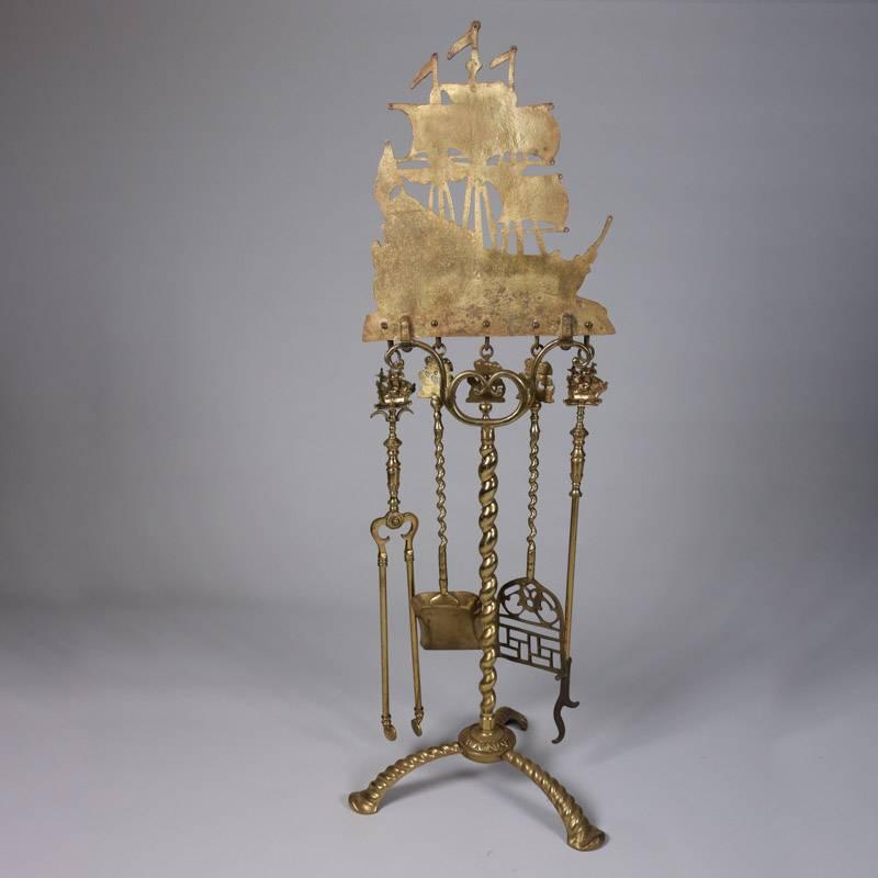 Antique cast brass nautical fireplace set features Donfer Mando tall mast clipper ship and rope twist form throughout, includes pierced coal shovel, ash shovel, tongs, short and long pokers, 20th century.

Measures: 48" H x 15" W x