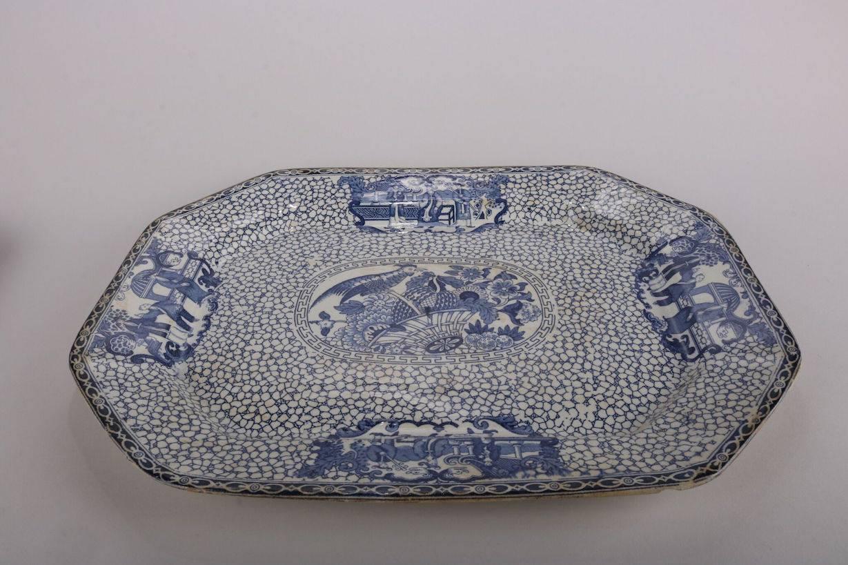 Set of two antique English William Adams Chinese Export stacking porcelain platters feature "Chinese Bird Pattern" in blue and white, en verso reads "This pattern was introduced by William Adams in 1780 being a copy of ironstone a