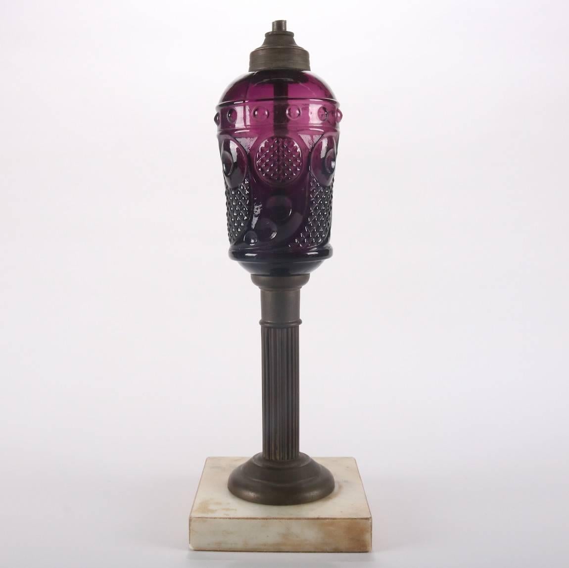 Antique and rare early American Pattern glass oil lamp features amethyst flint glass font in Comet or Horn of Plenty font by Mckee Sandwich Glass, reeded bronze column on marble base, drilled for electricity, circa 1880

***DELIVERY NOTICE – Due to