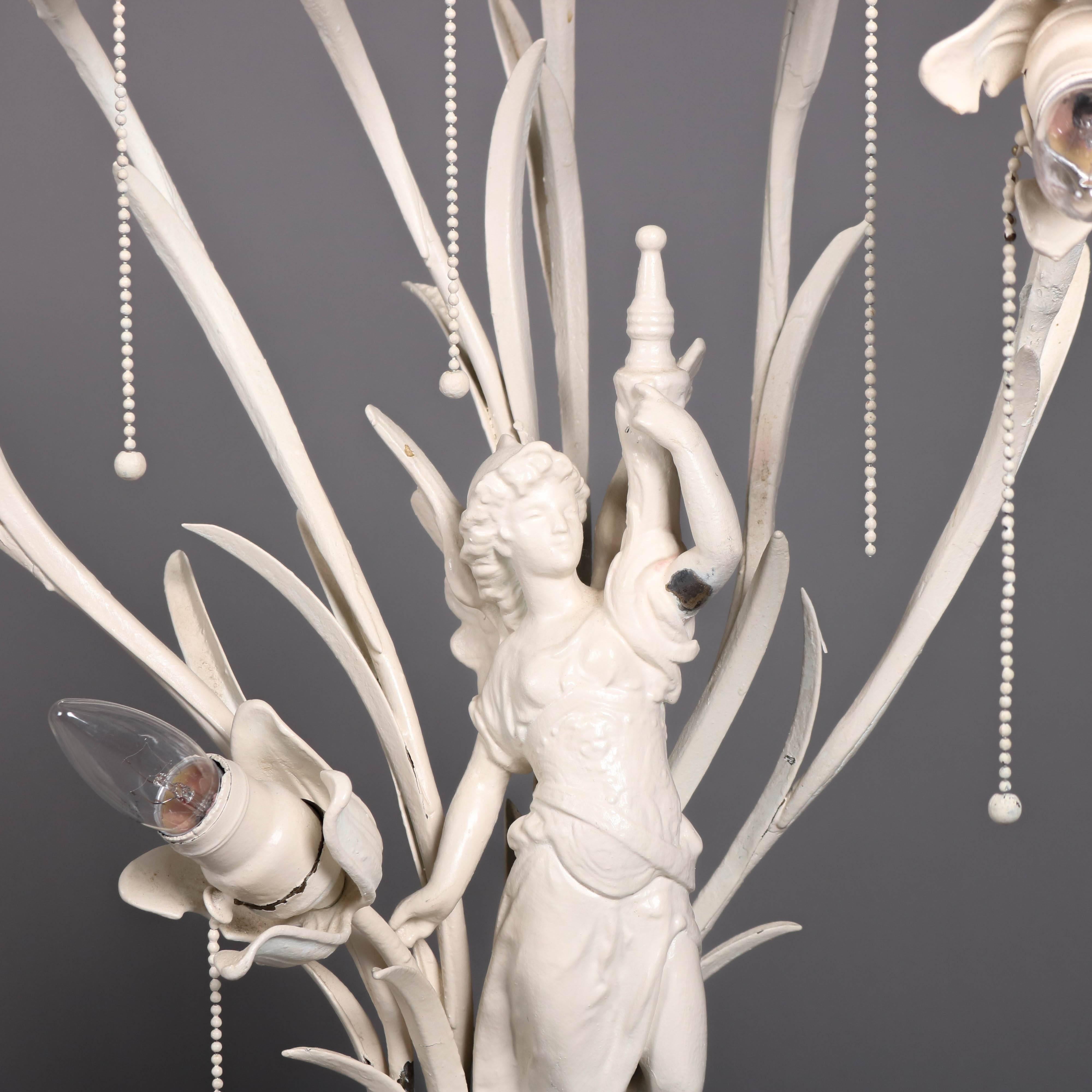Pair of oversized antique Art Nouveau figural post lamps each feature central classical woman atop foliate embossed base and surrounded by foliate stems terminating in flower form lights, early 20th century

Measures: 32