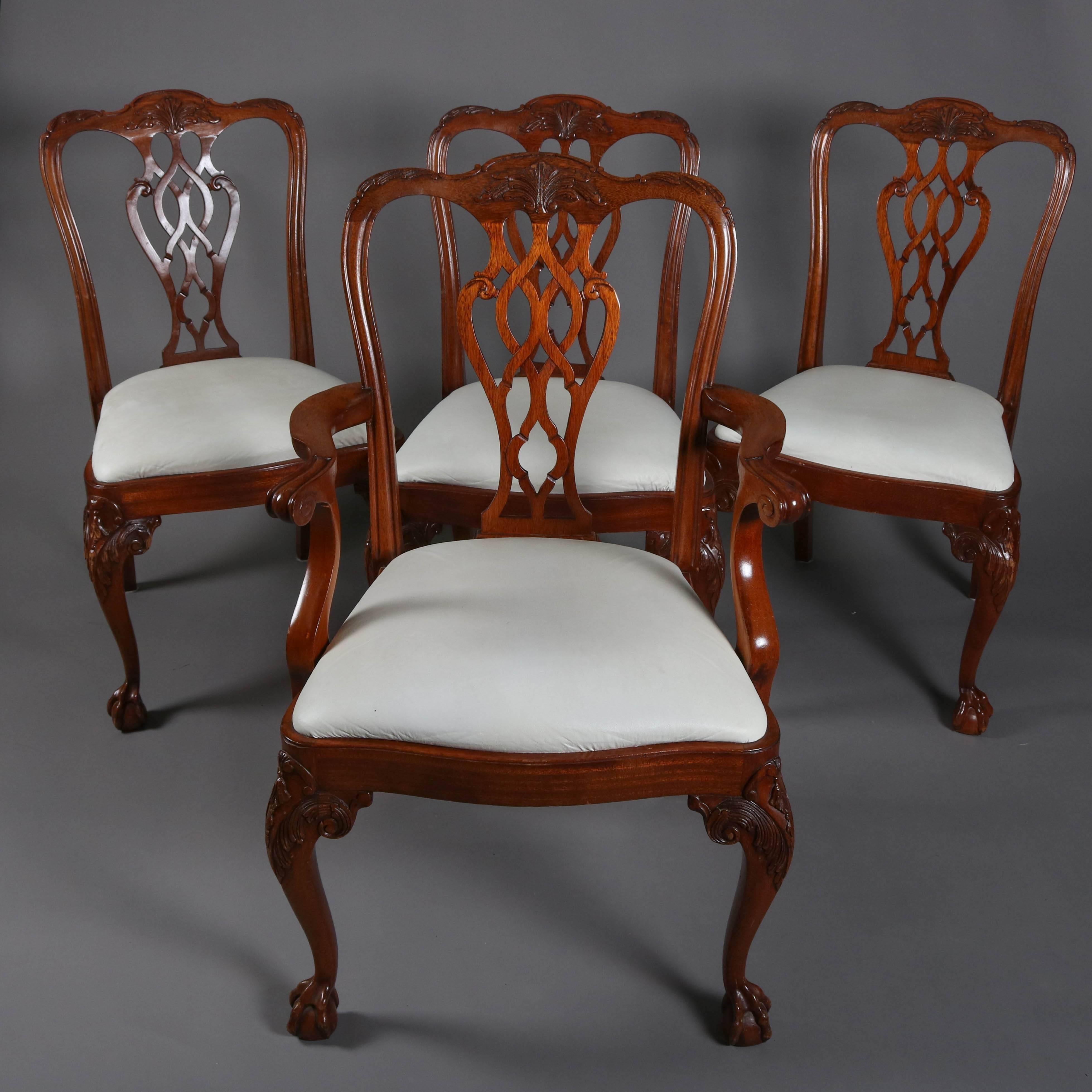 Set of eight Chippendale style flat back carved mahogany dining chairs

Measures: 39" H x 25" W x 22" D, 18" seat, armless: 39" H x 21" W x 18" seat.