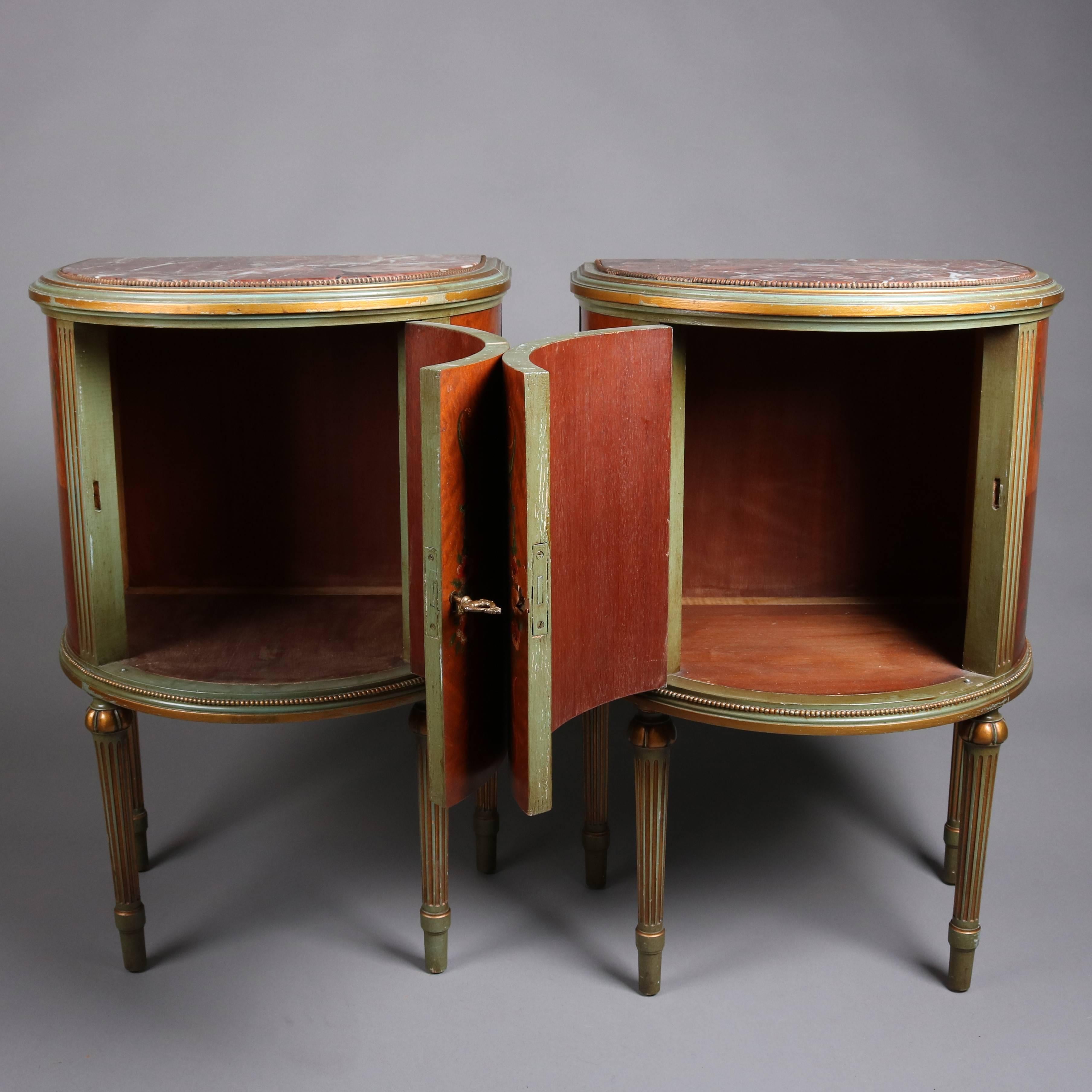 Pair of antique Adam style neoclassical satinwood high chest feature demilune form with bookmatched panel doors with hand-painted central floral spray bordered by foliate, ribbon and scroll garland, gilt decorated reeded trim, and seated on gilt