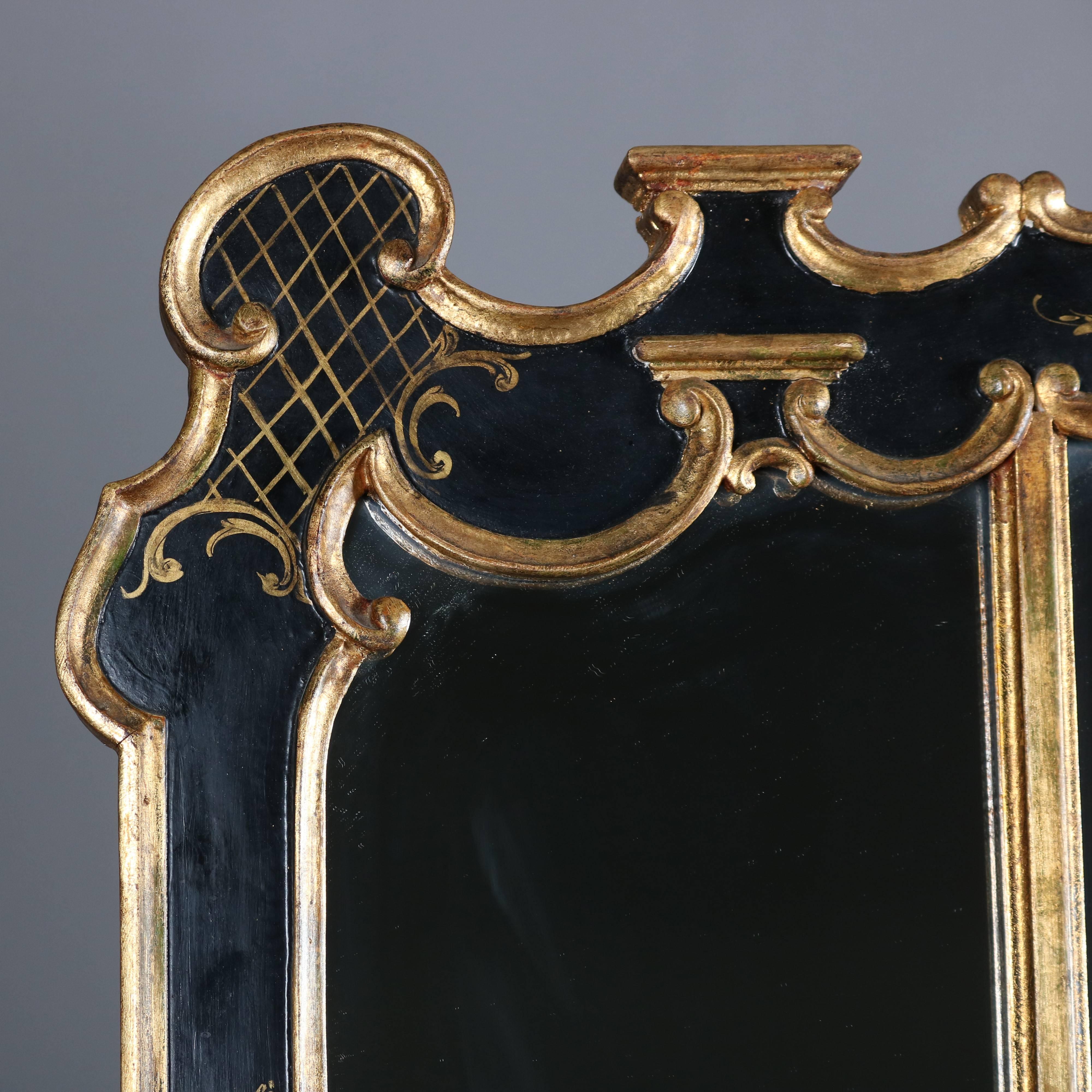 Antique chinoiserie triptych over mantel mirror features ebonized frame with gilt hand-painted flowers and bordering, 19th century

Measures - fr: 37.5" H x 49" W x 1.75" D, los: 30" H x 42" W.