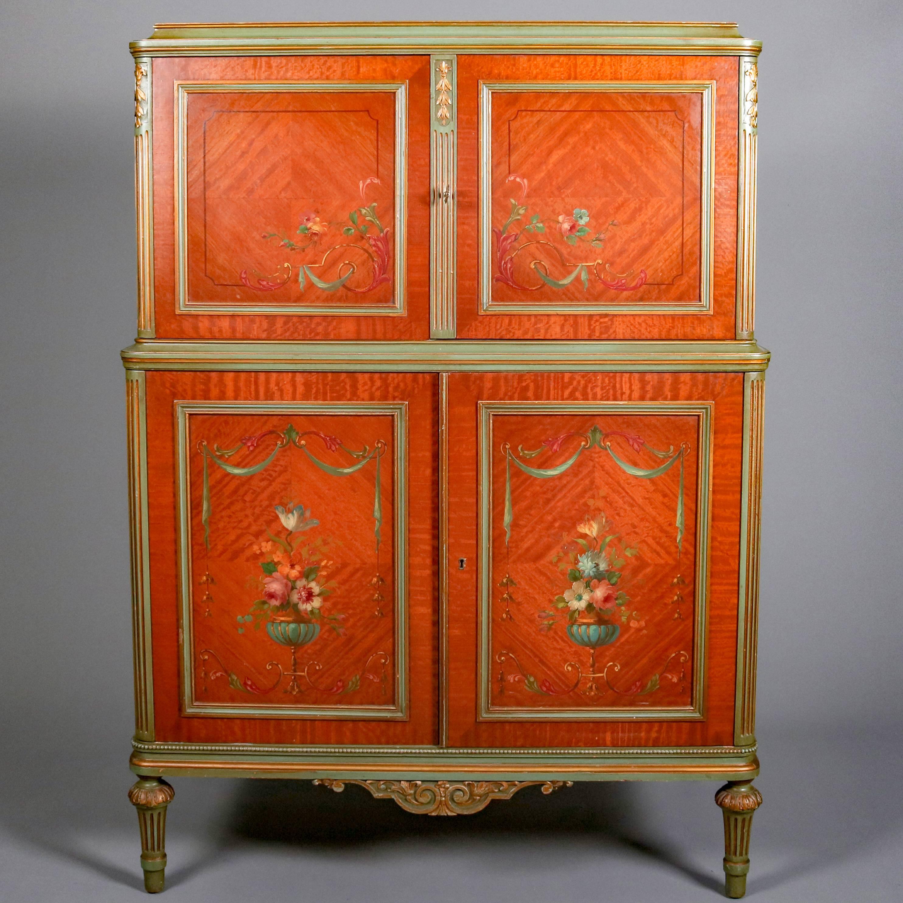 Antique Adam style neoclassical satinwood high chest feature bookmatched panel doors with hand-painted central floral and urn reserves bordered by foliate, ribbon and scroll garland opening to reveal interior apparel trays, gilt decorated reeded