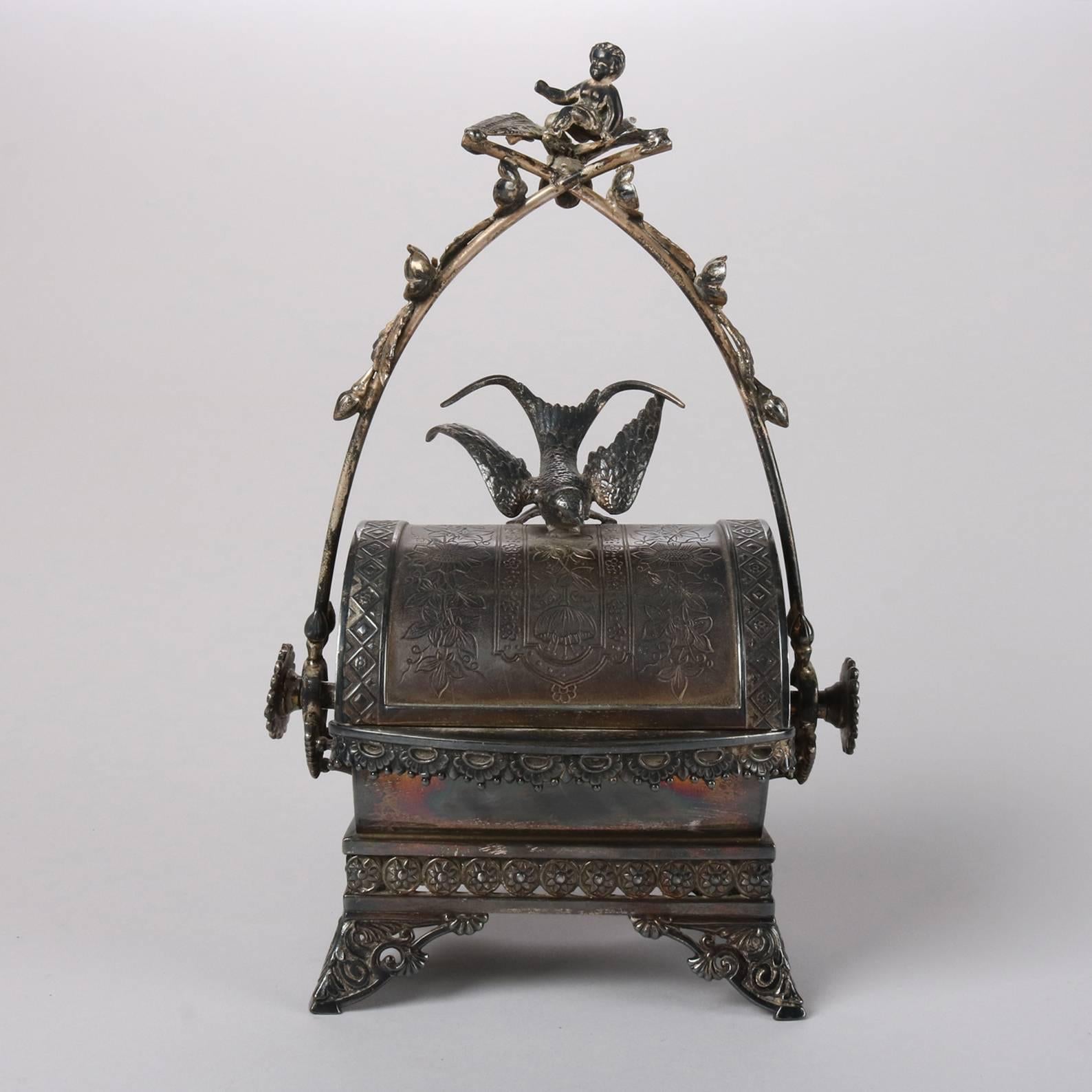 Antique Aesthetic Movement figural silver plate footed jewelry casket, features cherub seated atop handle, sparrow (bird) seated on roll back top, and allover floral and foliate incised decoration, 19th century

Measures: 10.5