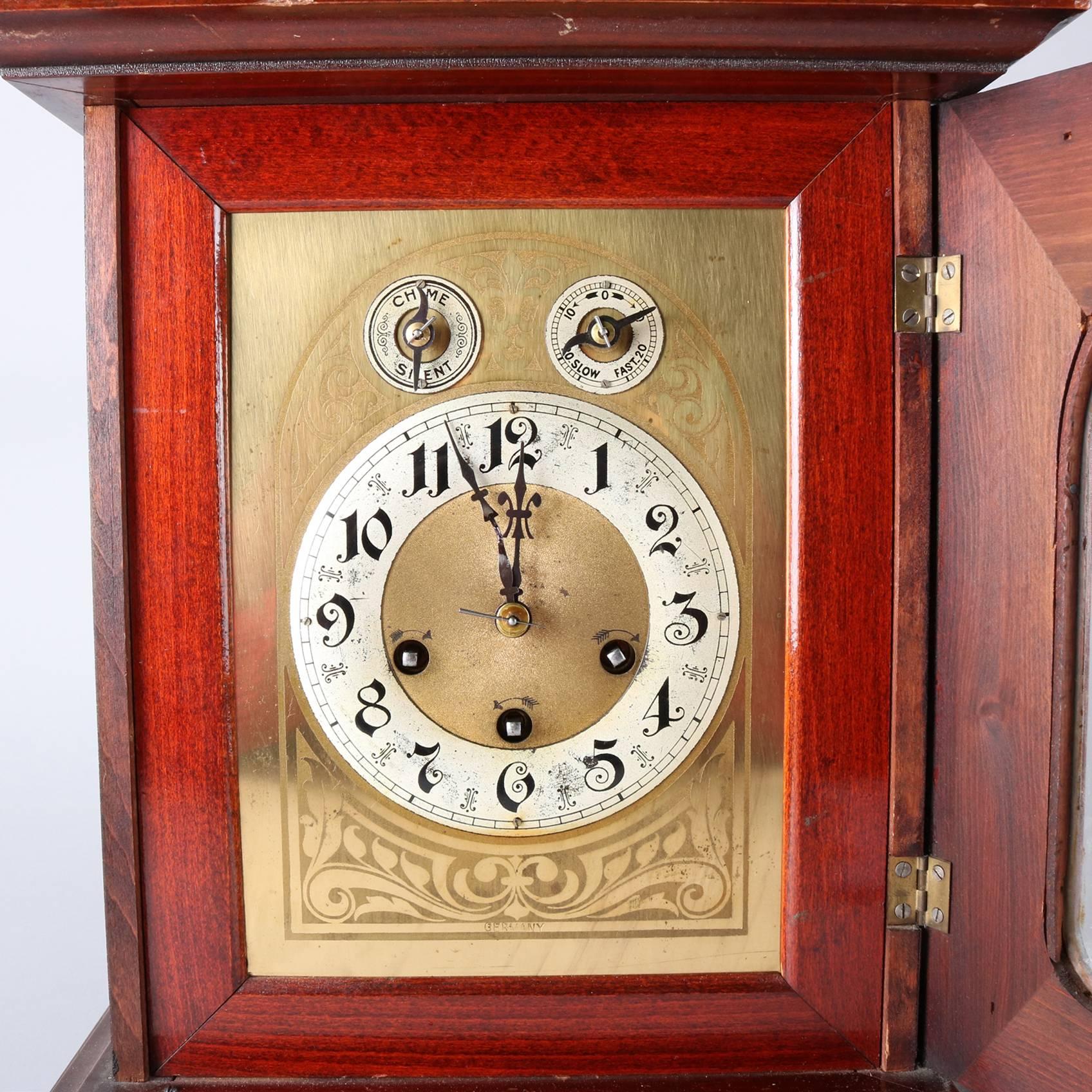 Antique German bracket clock features works by Junghans with a scroll decorated case marked 