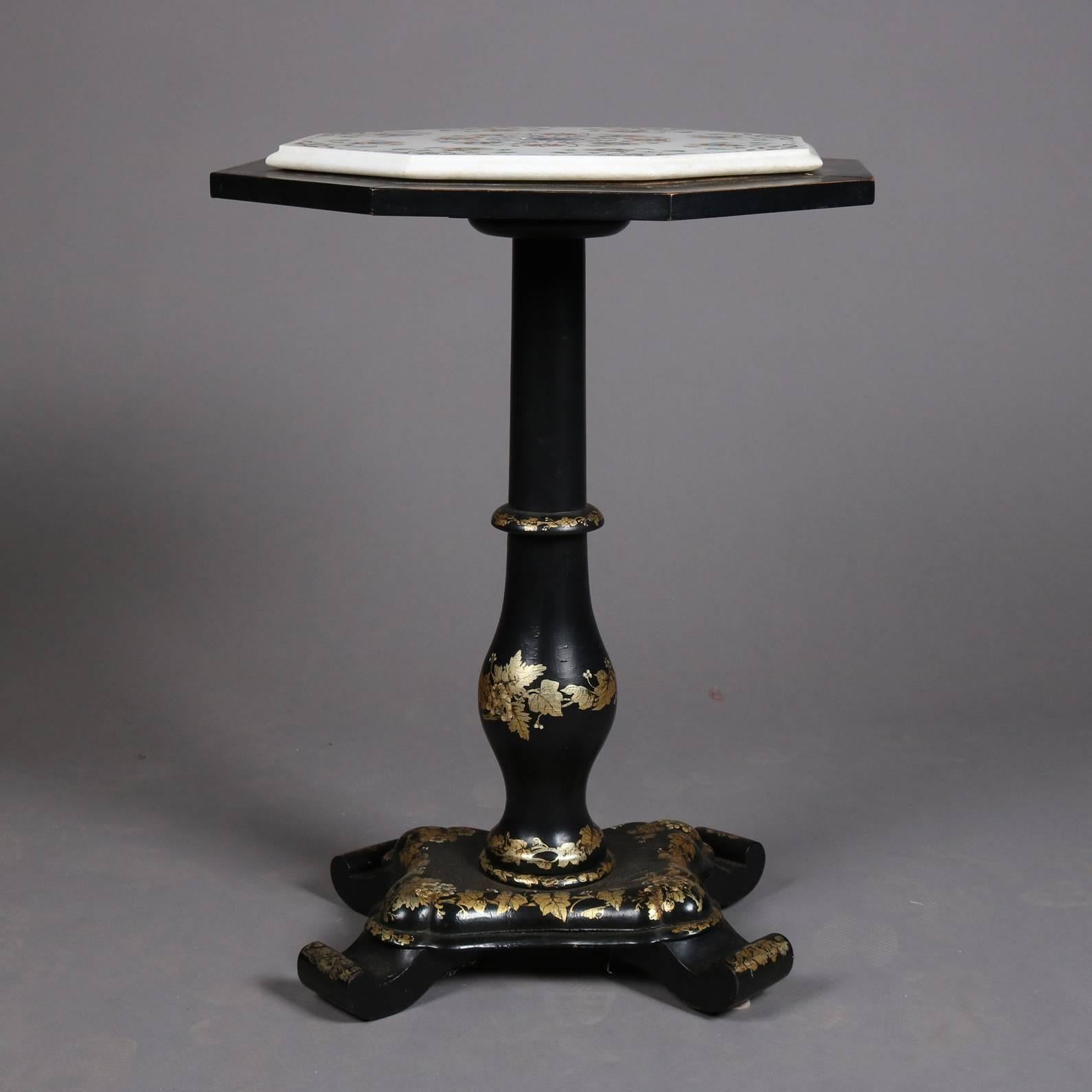 Antique ebonized Stand features grape vine gilt decoration, scroll feet, and marble top with mother-of-pearl and shell floral mosaic, replacement top, 19th century

Measures: 26.25