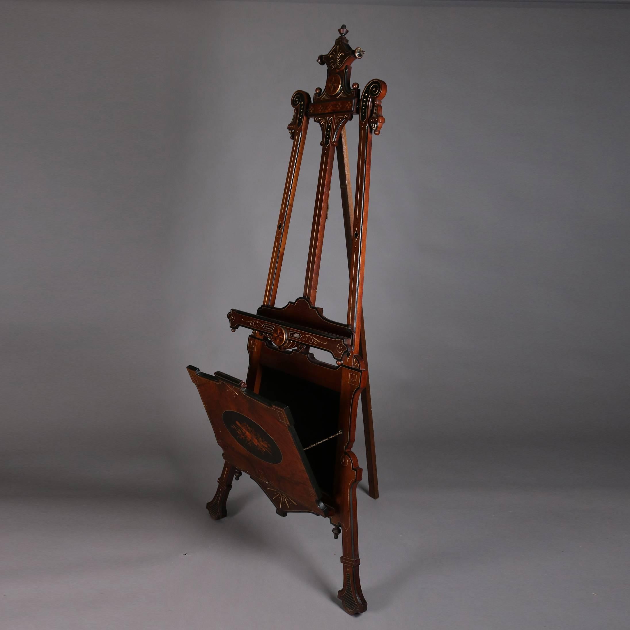 Antique Renaissance Revival Killian Brothers art easel features burled walnut construction with satinwood inlay marquetry, ebonizing, and gilt highlights, with lower portfolio with central reserve, 19th century

Measures: 79