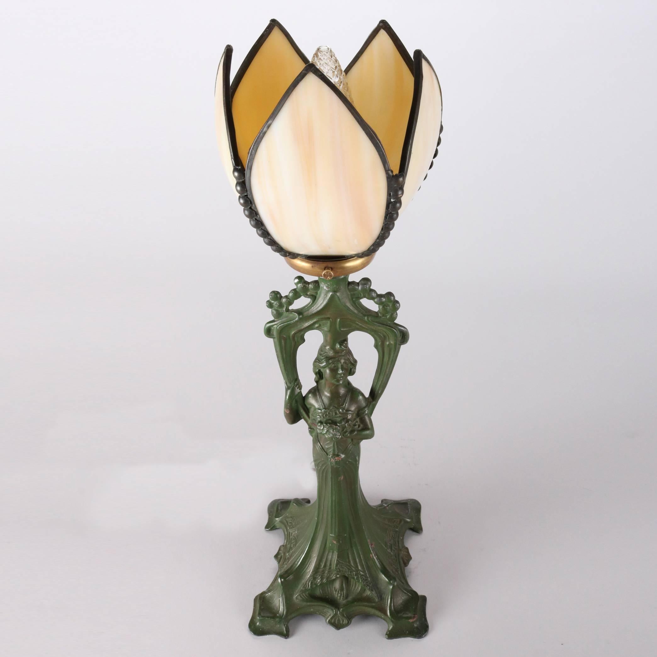 Antique Art Deco green painted figural Frankart School table lamp features woman with floral bouquet, her sweeping dress forming the footed base supporting replacement slag glass tulip form shade, elements of Art Nouveau Mucha School, newly