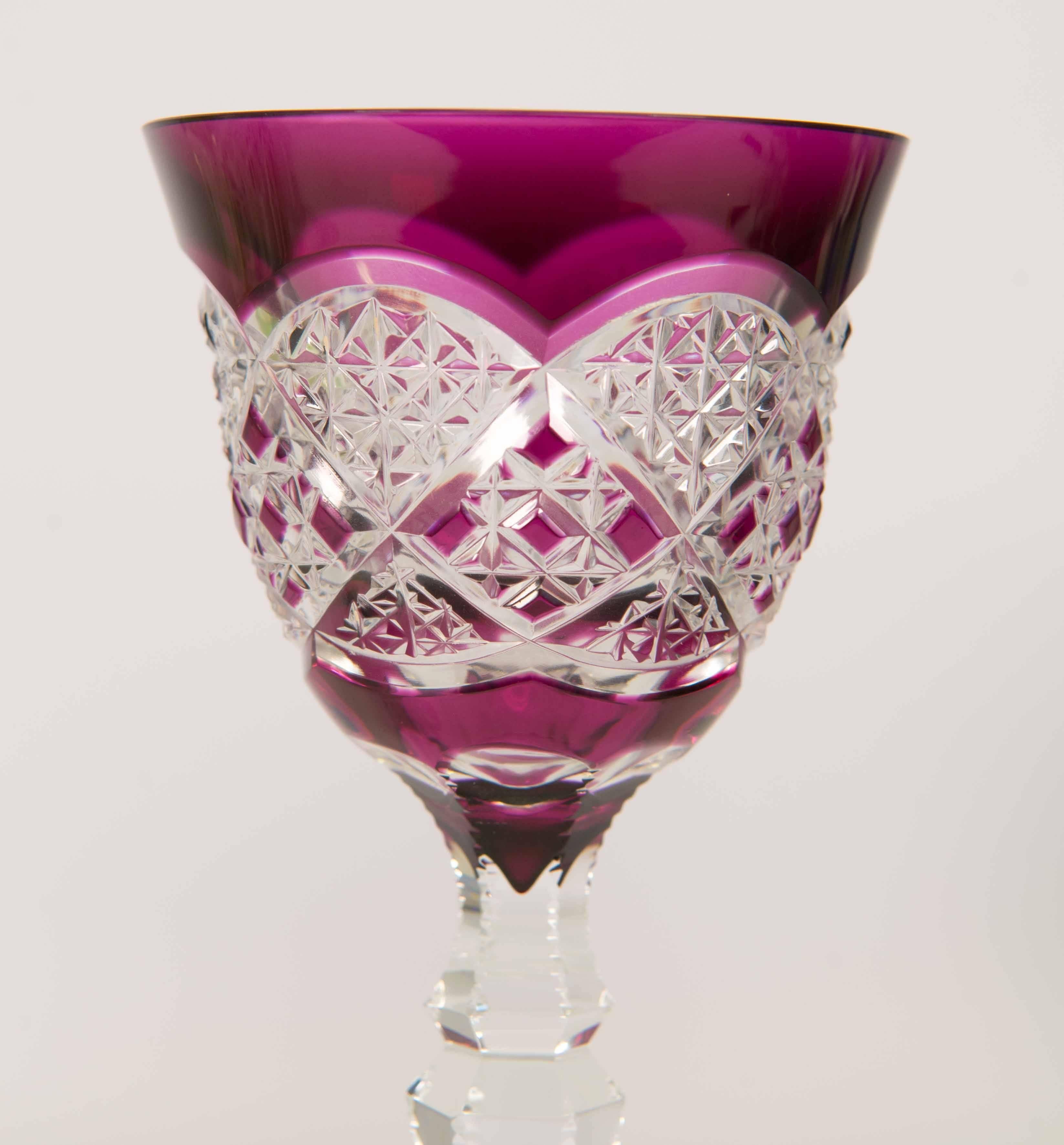 This set of six glasses is made by Val Saint Lambert in Belgium. The company is well known for it's cut crystal and cut glass designs. This is a set of six of the nicest glasses we've seen in a long time. Mint condition and signed Val Saint Lambert