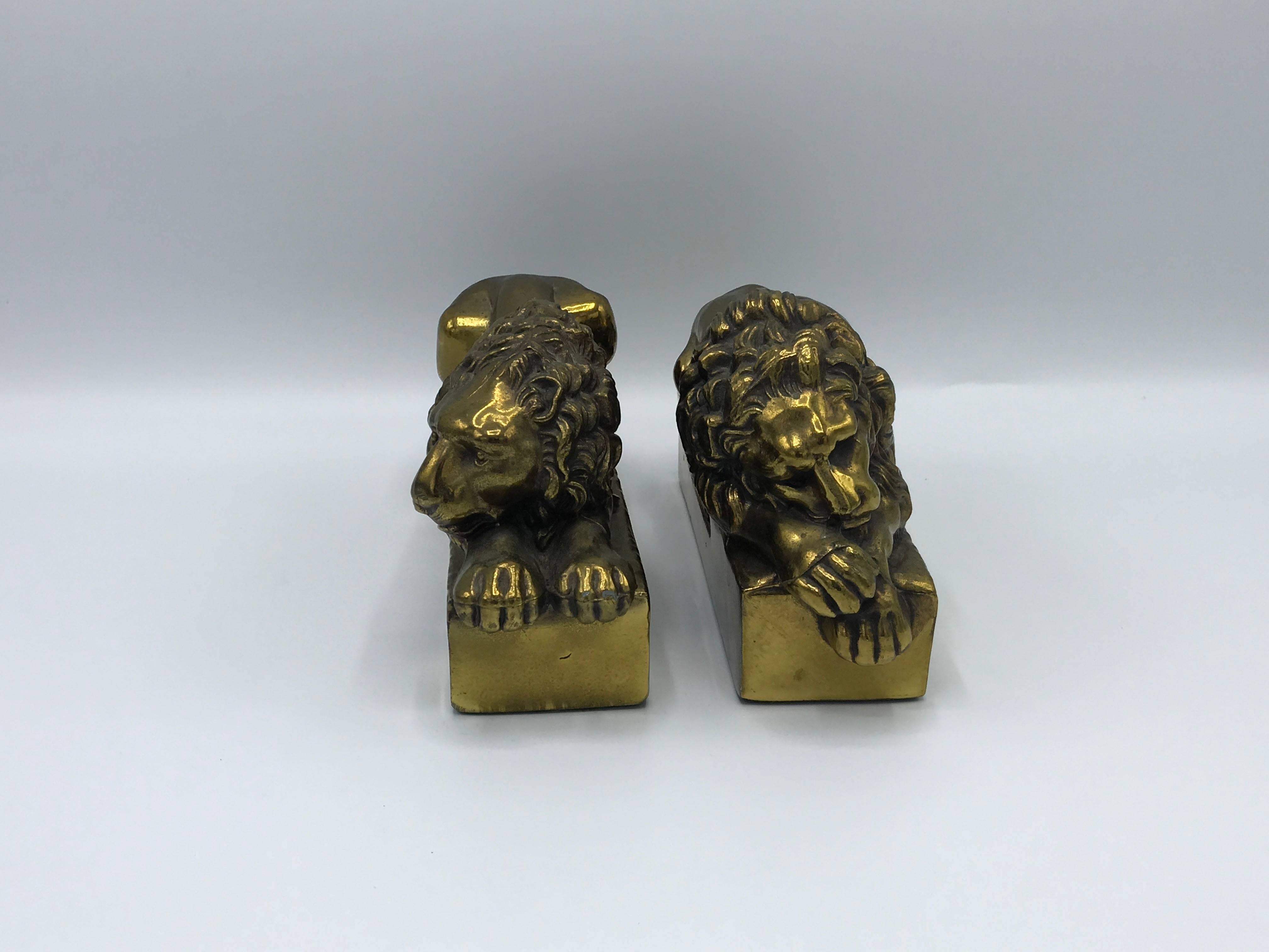 Offered is a stunning, pair of 1940s polished bronze lion bookends. Signed: "Antonio Canova. 1757-1872." These lions were originally sculpted by Antonio Canova (Italian, 1757-1822) in larger scale for the tomb of Pope Clement XIII in St.