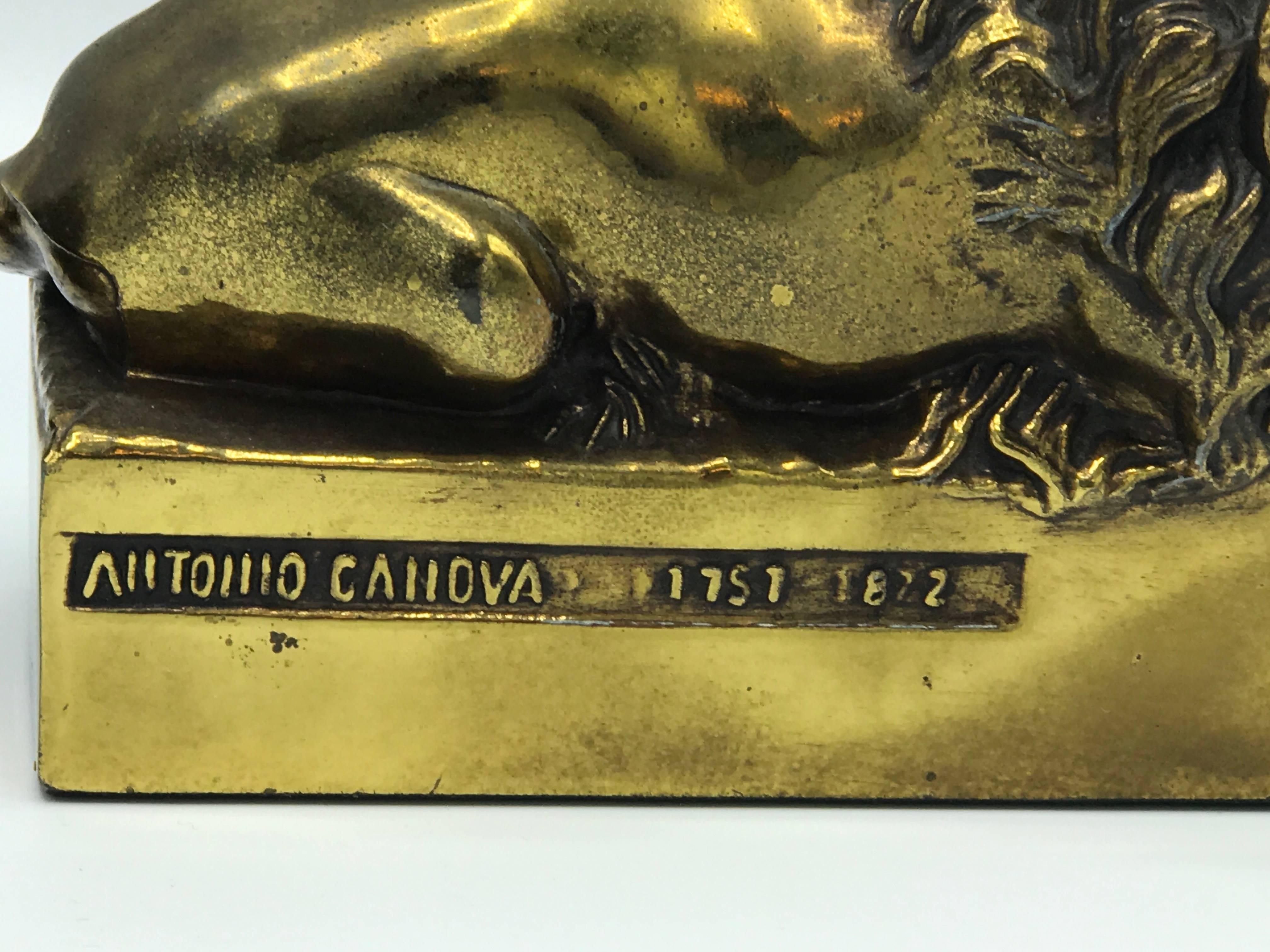 Poli Paire de serre-livres lion en bronze des années 1940