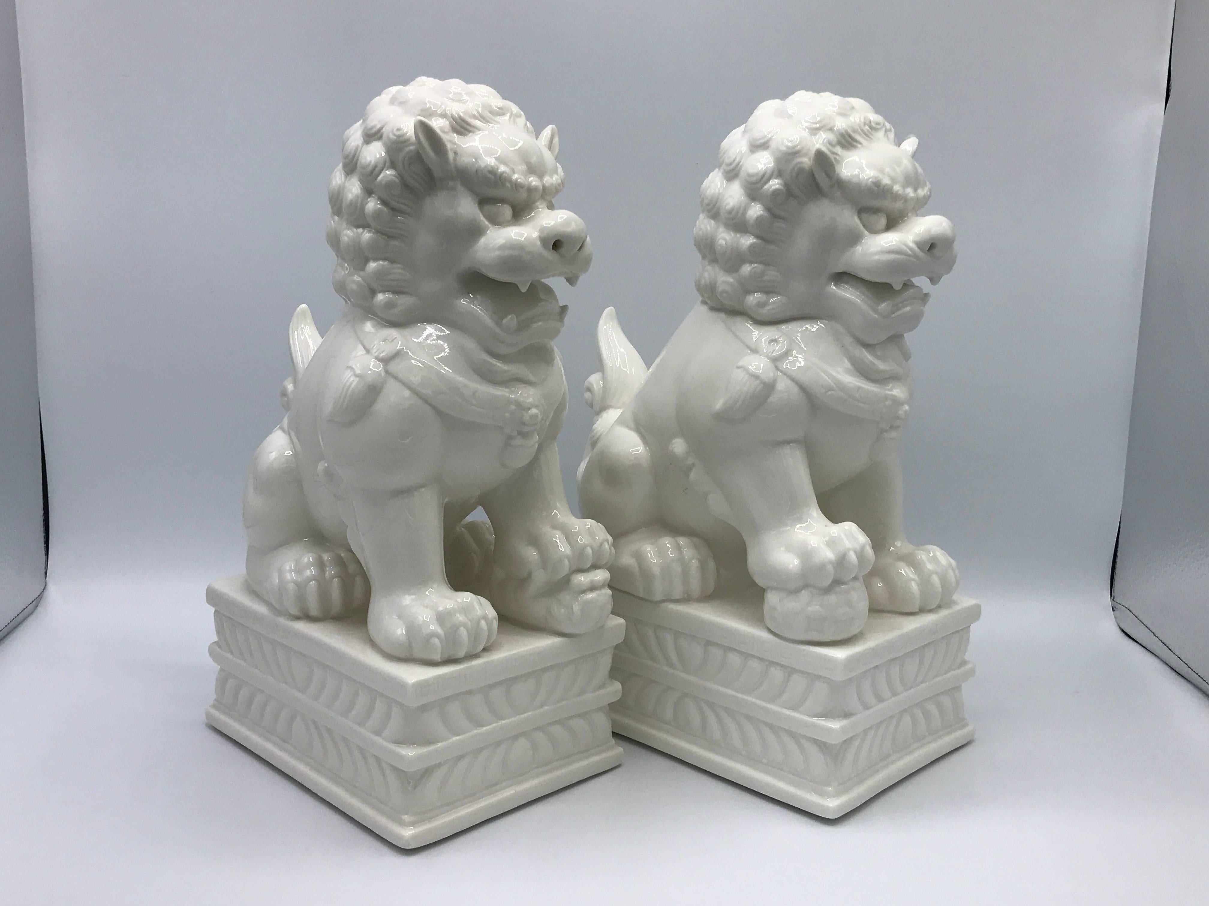 Offered is a stunning pair of 1960s, large foo dog statues. Would make great bookends!