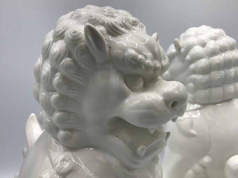 1960s Large Blanc de Chine Foo Dog Statues, Pair For Sale at 1stdibs
