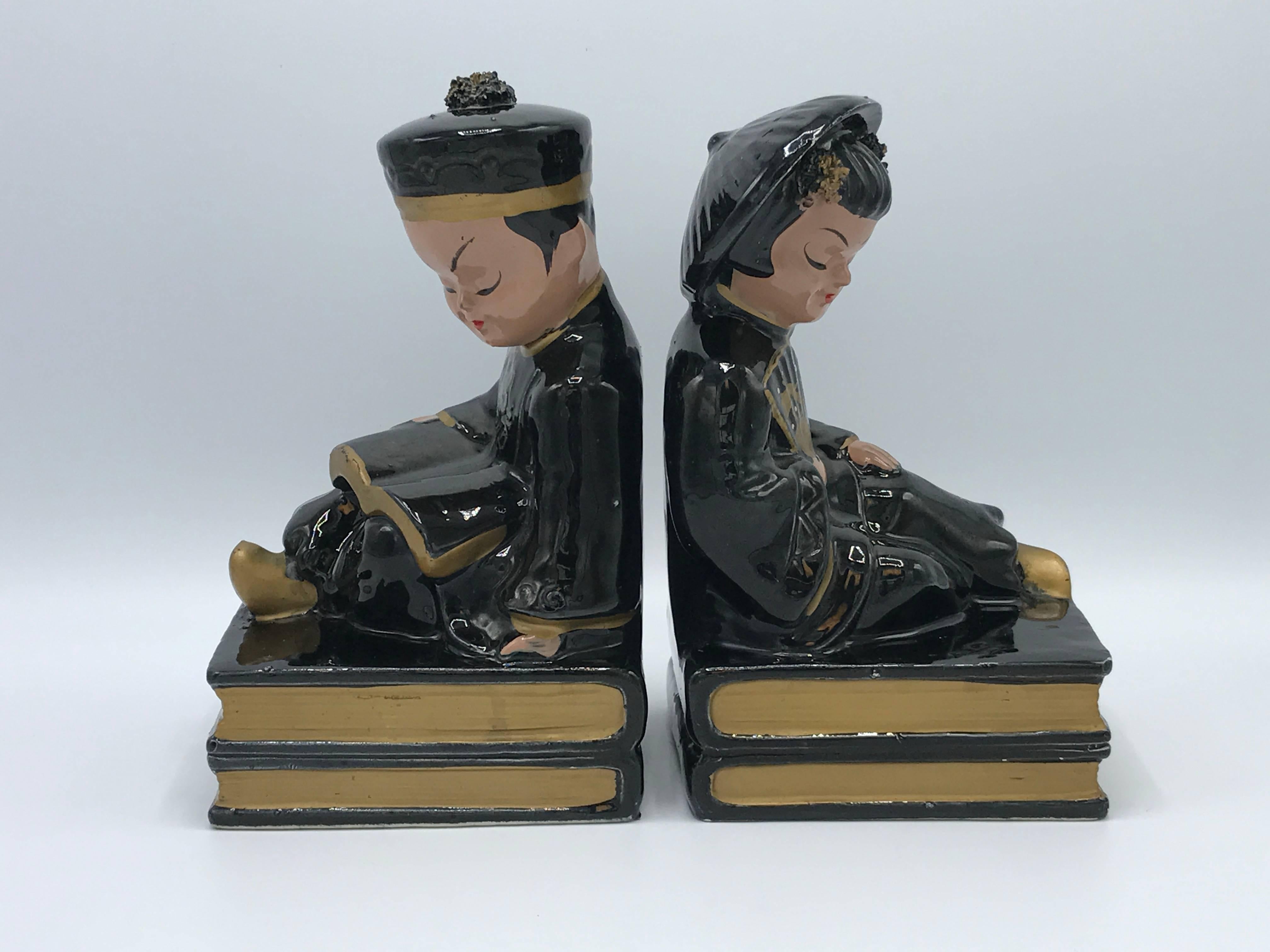 Offered is beautiful, pair of 1960s black and gold Asian figural bookends.