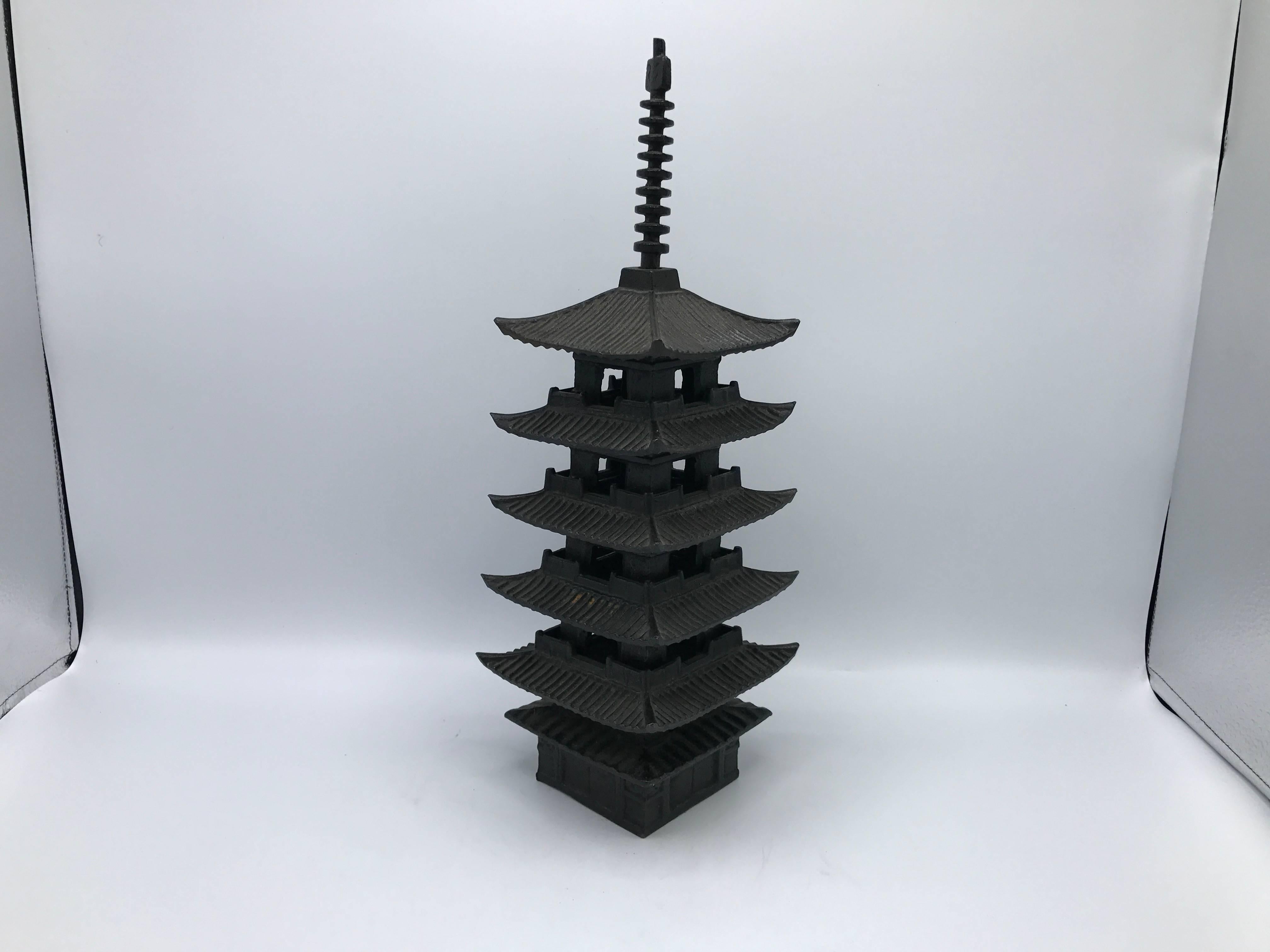 Offered is substantial and gorgeous, 1950s iron pagoda statue. Heavy.