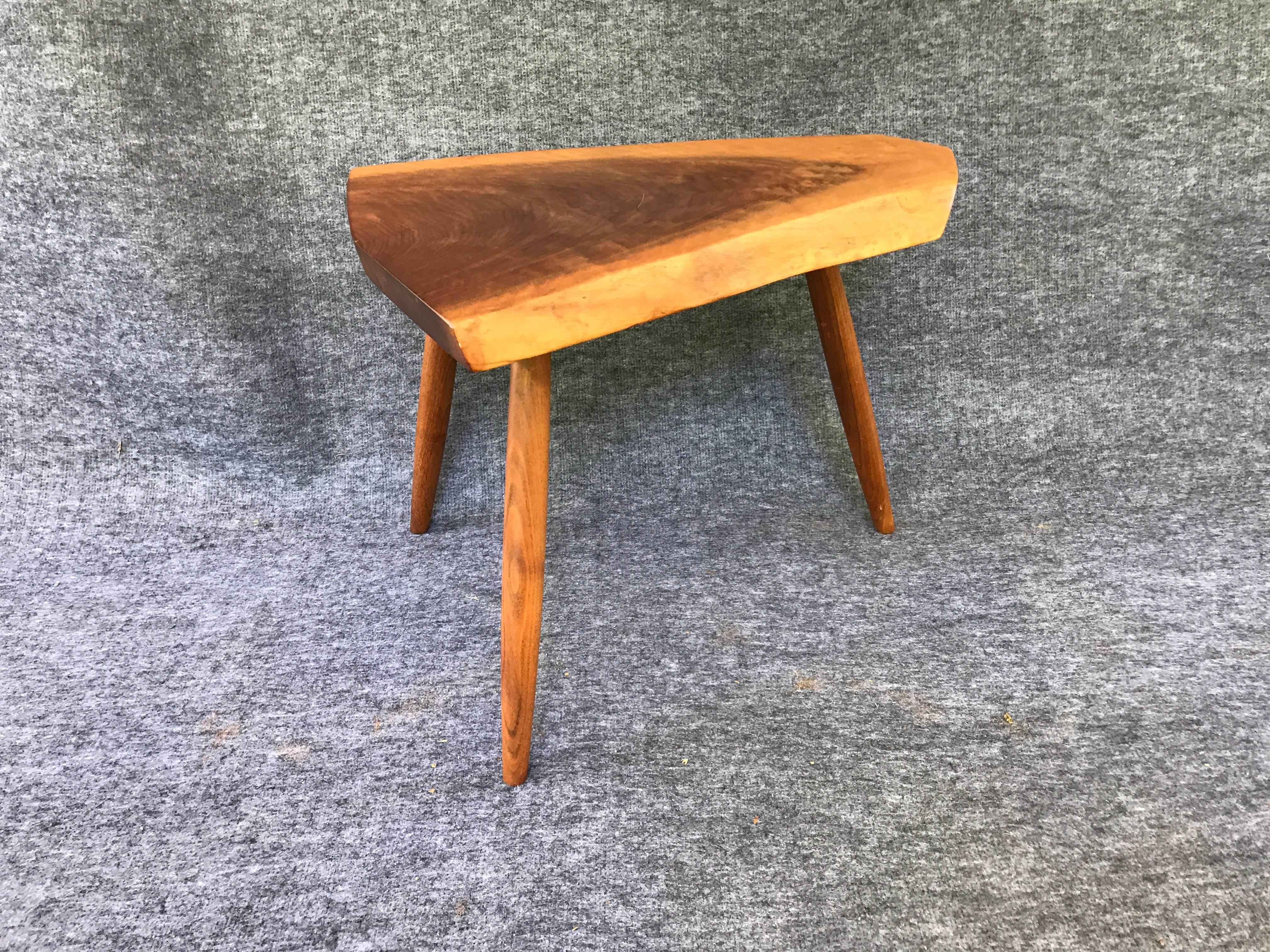 Offered is a stunning, 1980s George Nakashima Studio coffee or side table. Signed and marked on underside, 1981.