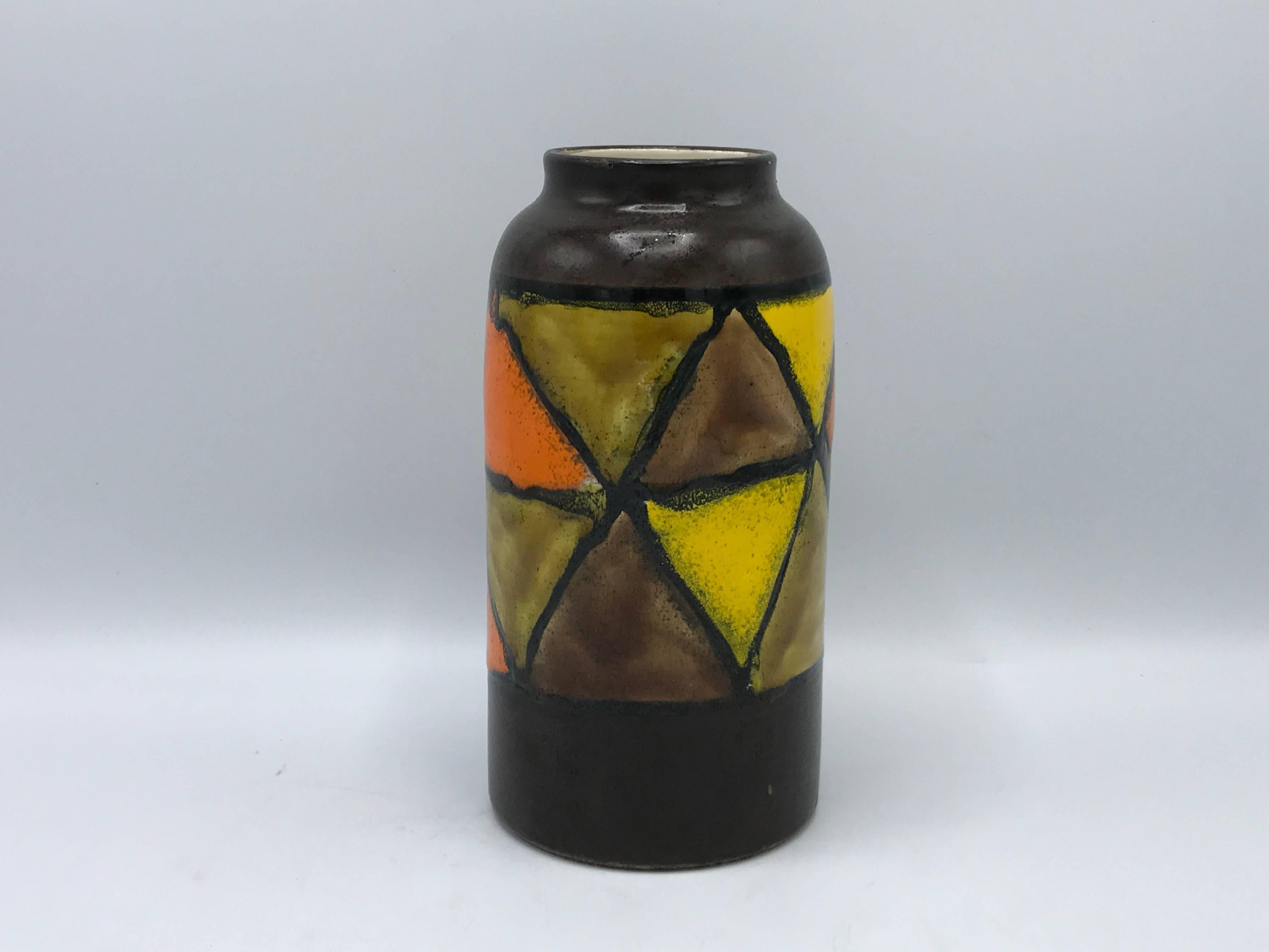 Offered is a fabulous, 1960s, Italian, Aldo Londi, Bitossi for Raymor, glazed ceramic vase. The piece has beautiful shades of orange, brown, yellow, and green. Signed on underside.