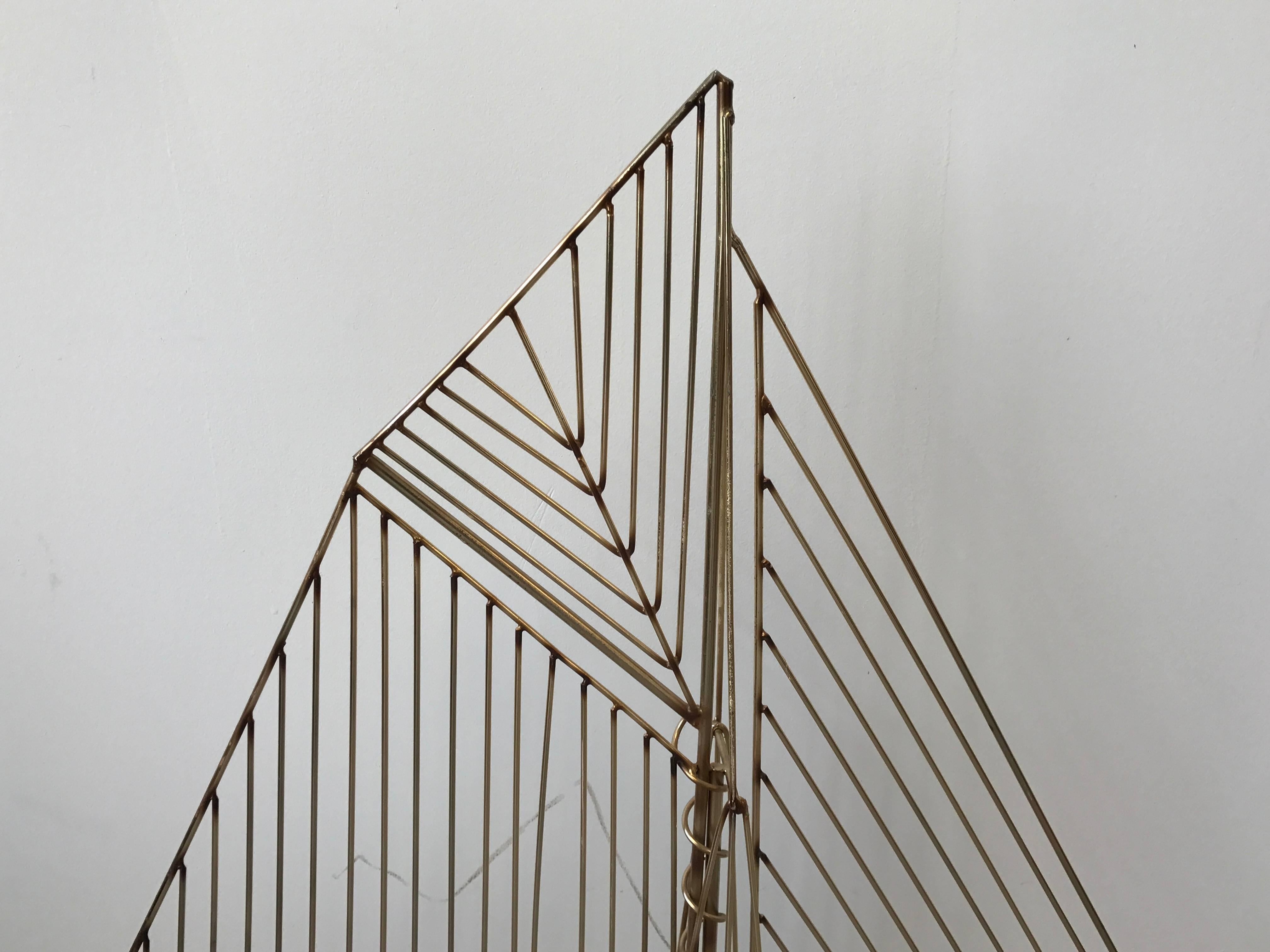 Offered is a stunning, authentic 1980s C. Jere brass sailboat sculpture. Signed: C. Jere, 1982.