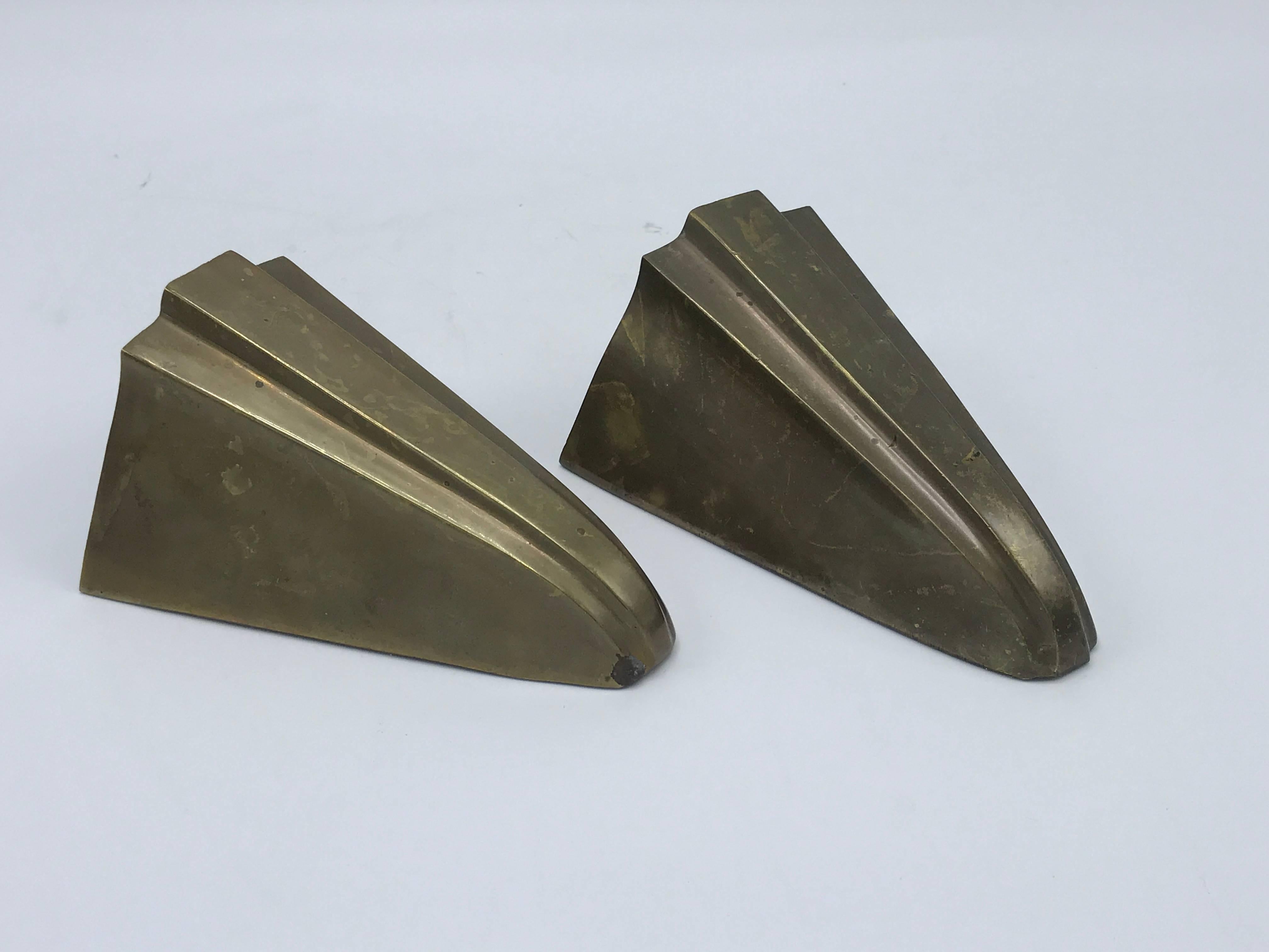 Offered is a stunning pair of 1950-1960s brass wall pockets, in the Art Deco style.