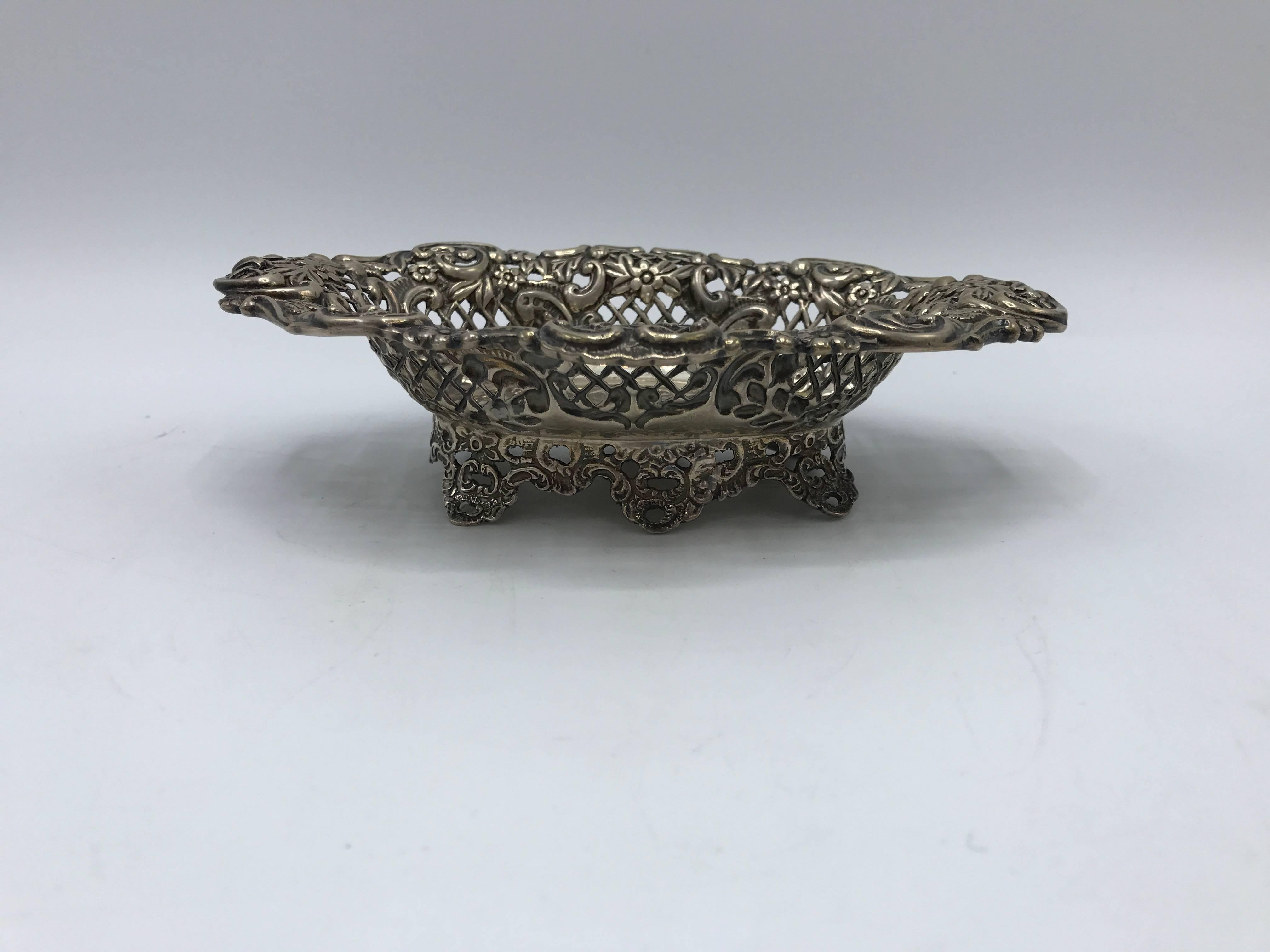 Offered is a stunning, 19th century English sterling silver pierced dish. Immaculate detailing.