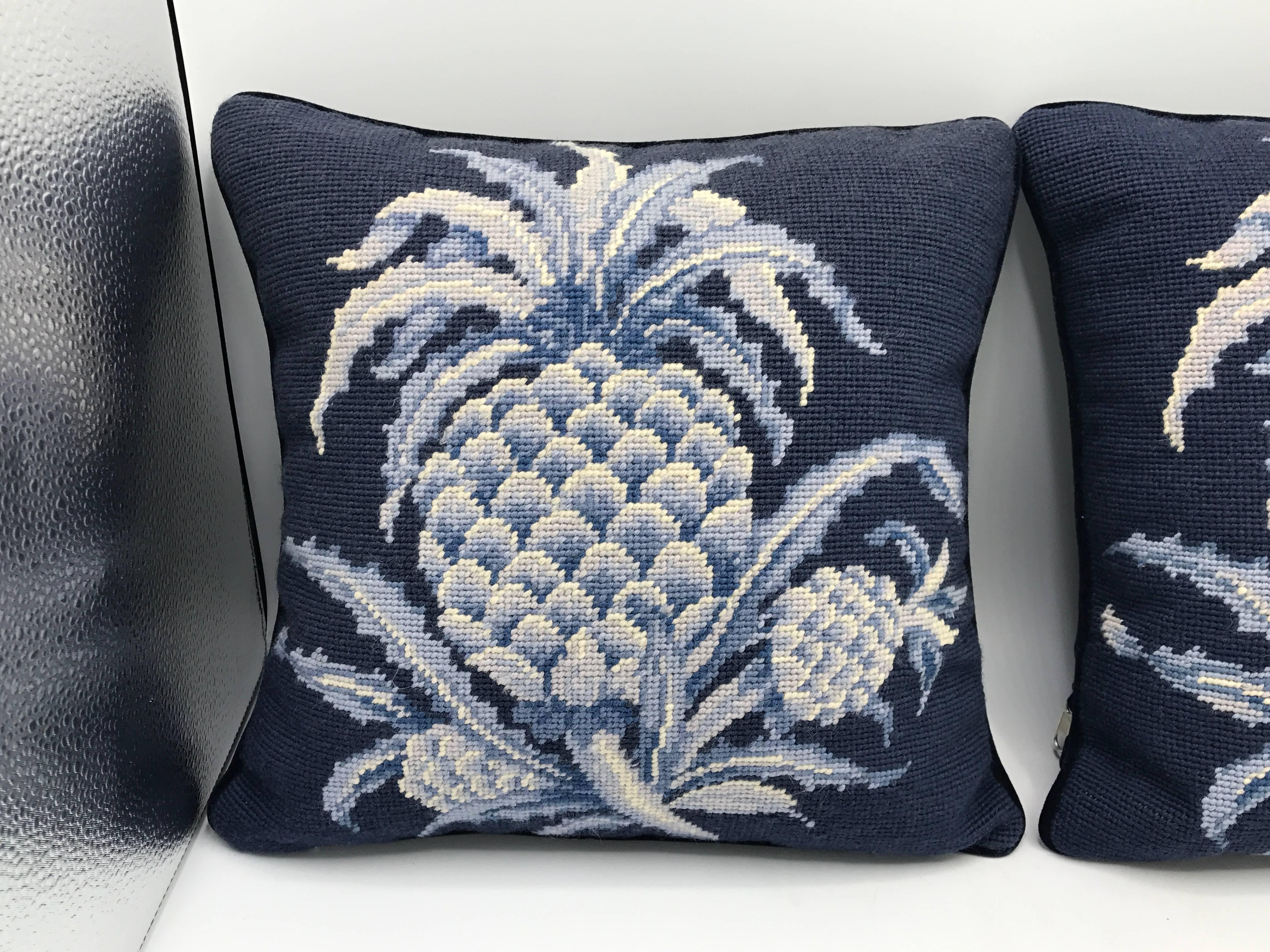 Offered is a gorgeous, pair of 1980s blue and white needlepoint pillows with a pineapple motif. Velvet back. Zipper. Poly-blend fill.