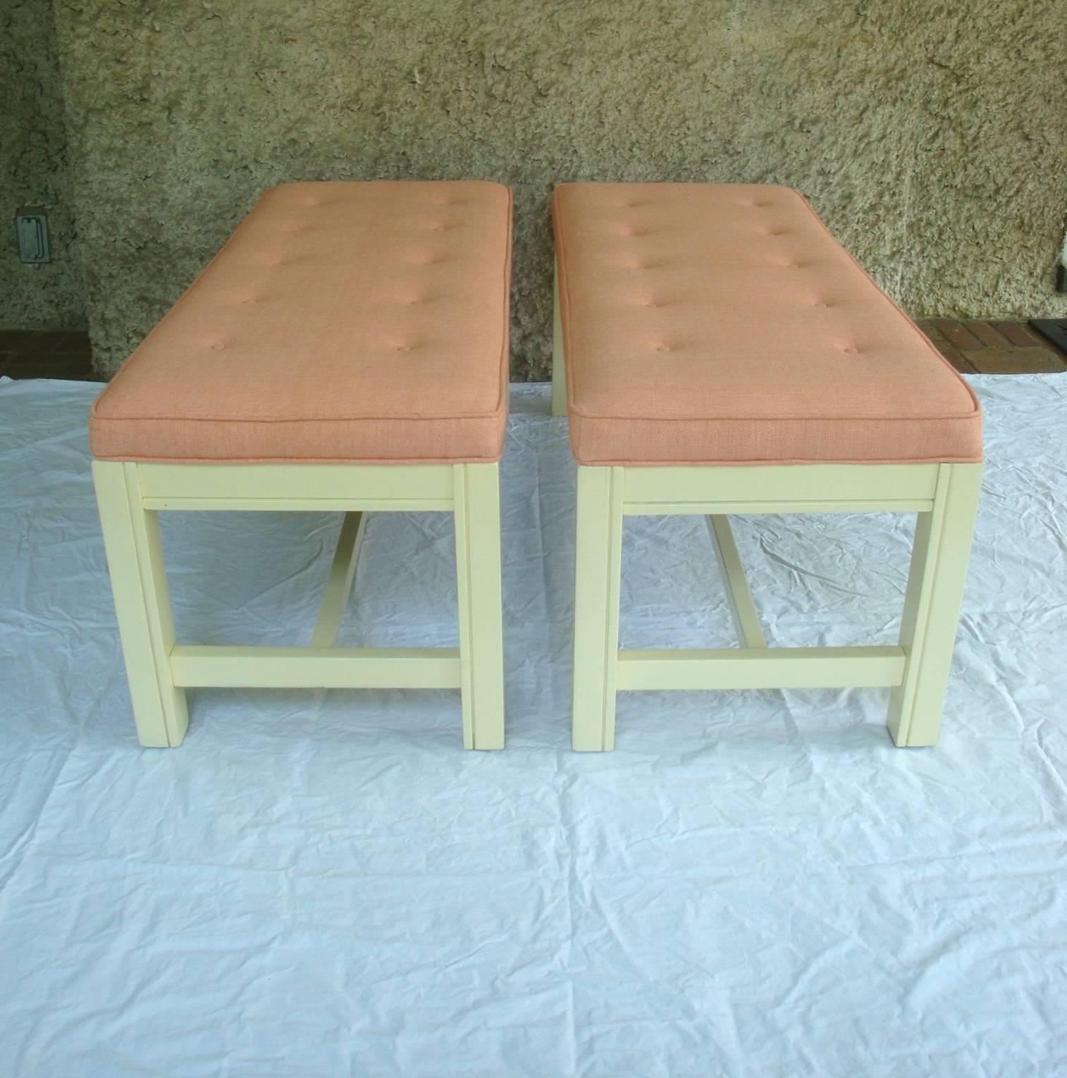 Offered is a gorgeous, pair of 1960s long Parsons benches. These very sturdy pieces have been recently reupholstered in a nubby soft-orange linen-blend fabric by Thibaut, with button tufting on the attached cushions and welting around the edges. The