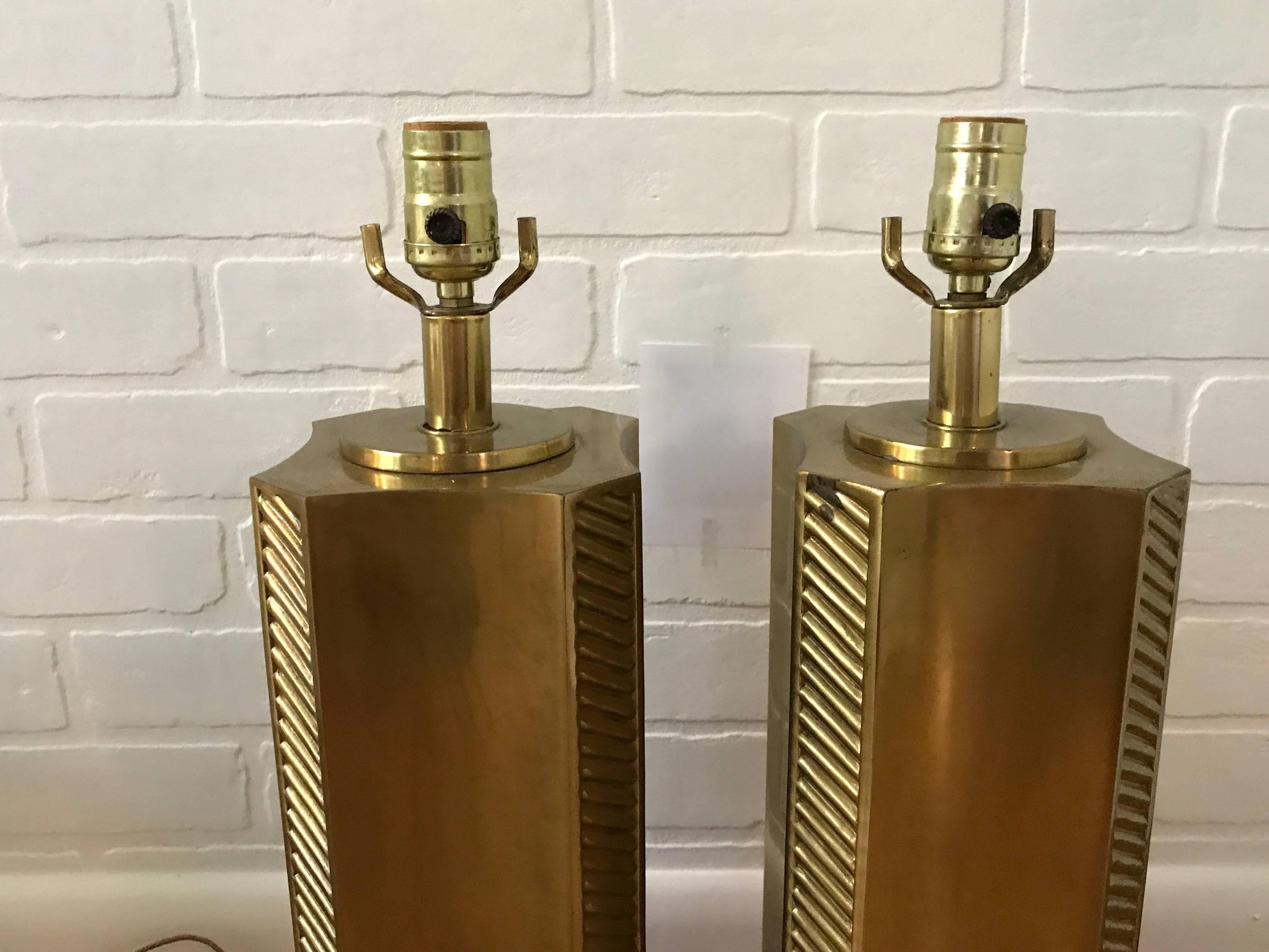 Offered is a stunning pair of 1960s Italian brass column lamps. Hollowed inside, heavy-thick brass.