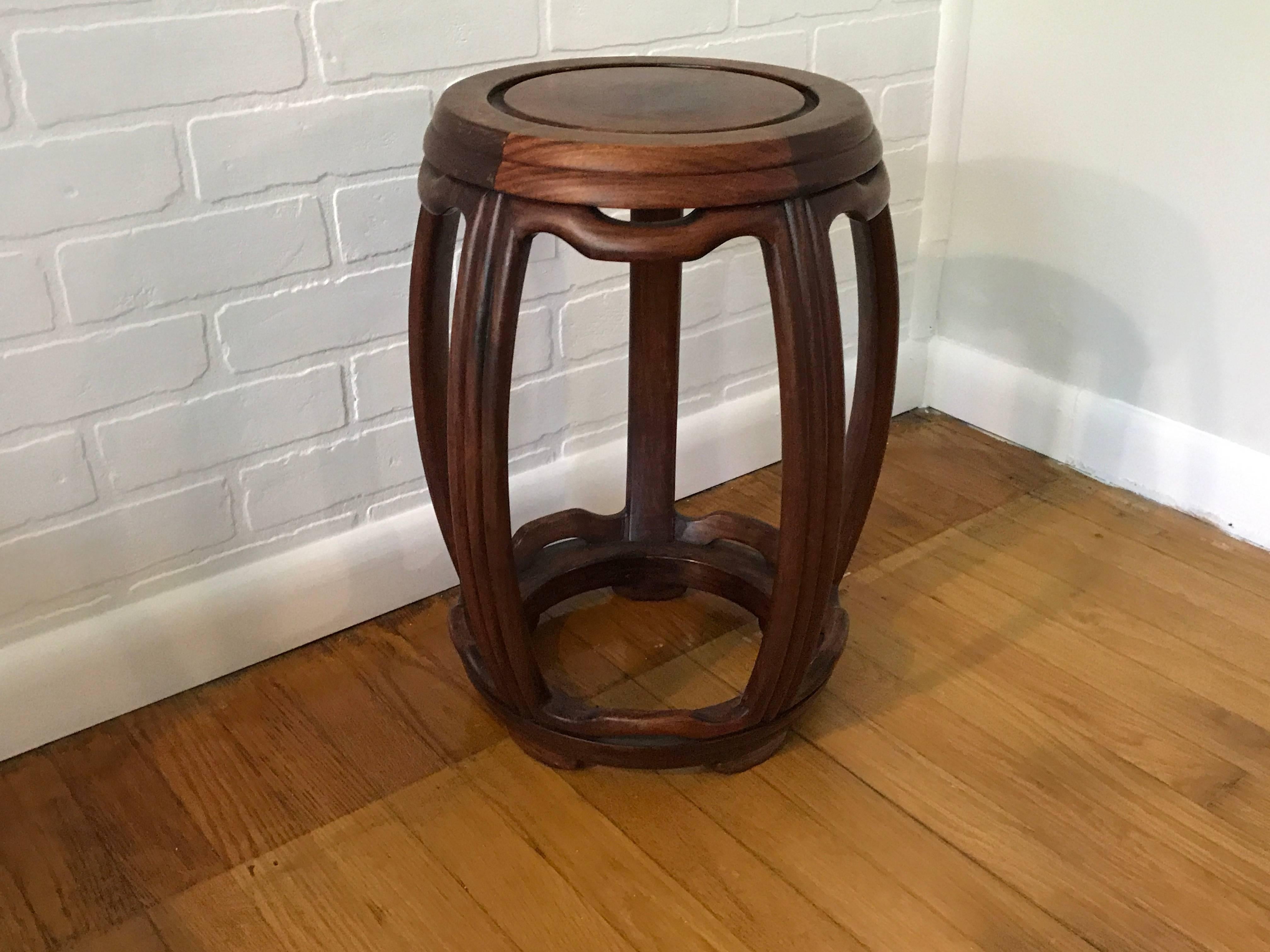 Offered is a fabulous, 1950s Ming-style wooden garden stool. Extremely sturdy. 11