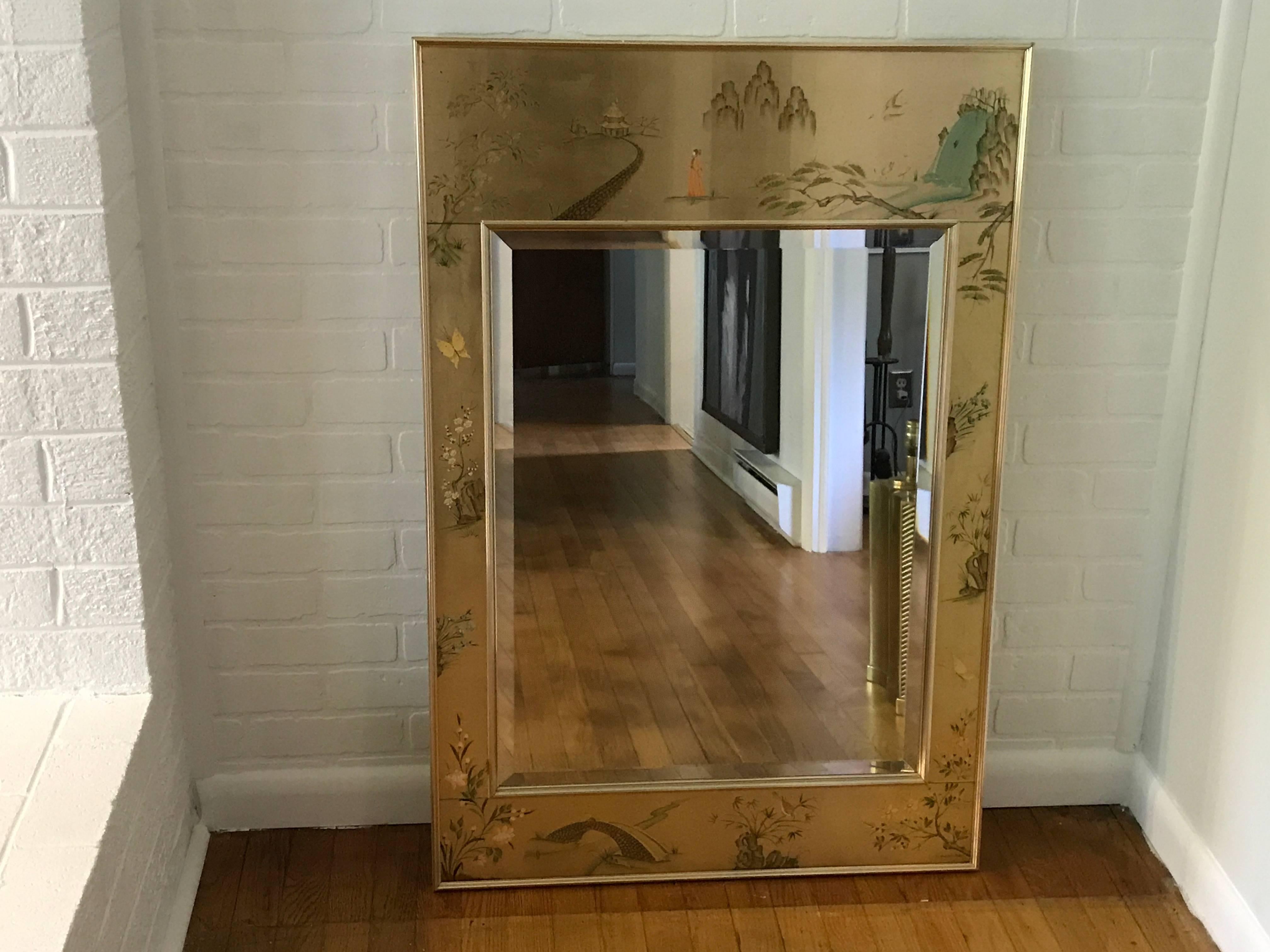 Offered is a stunning, pair of 1980s La Barge gold chinoiserie mirrors with a thick brass colored steel framing.