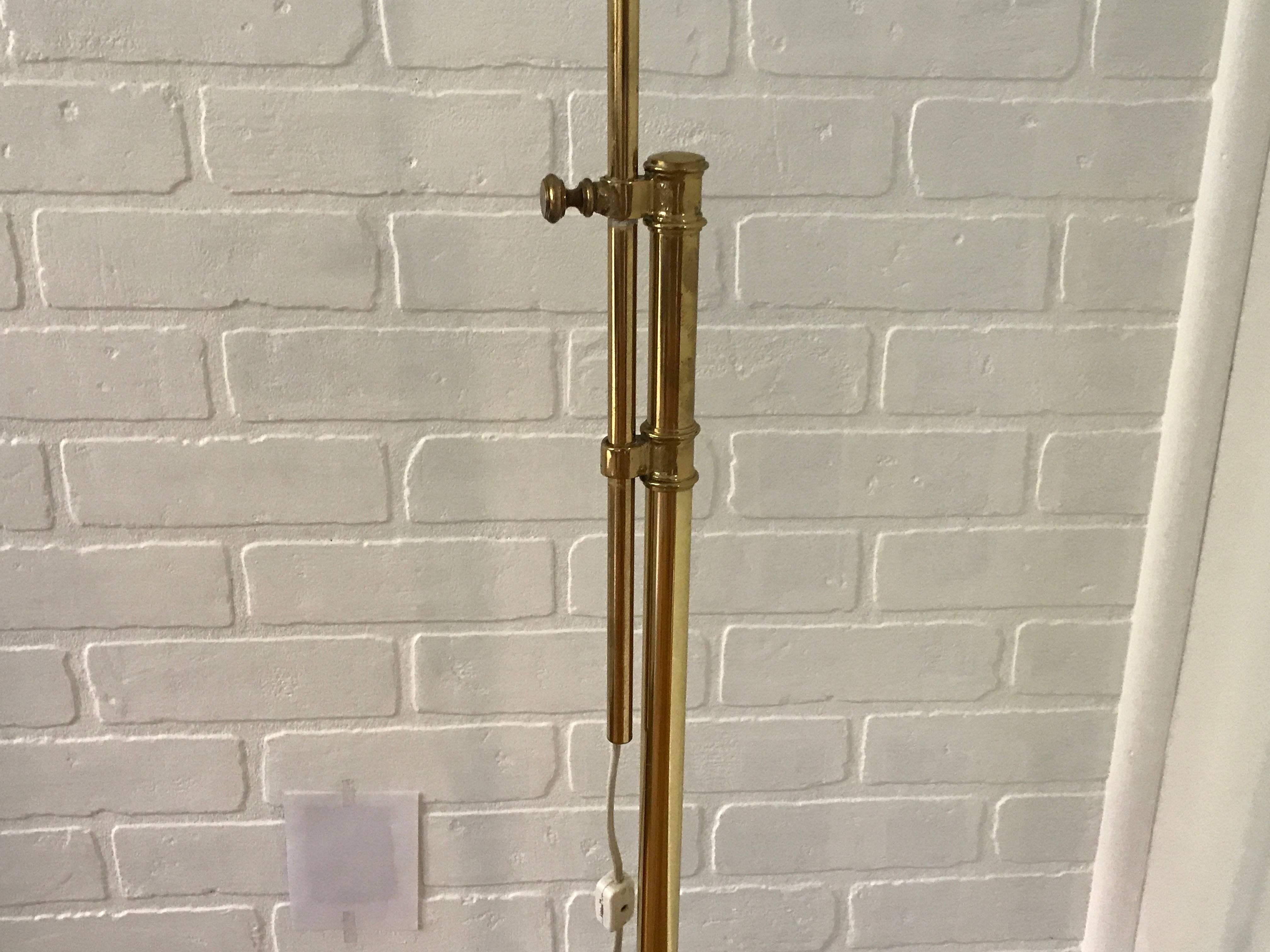 Offered is a gorgeous, 1970s brass seashell adjustable floor lamp. Highest, 55