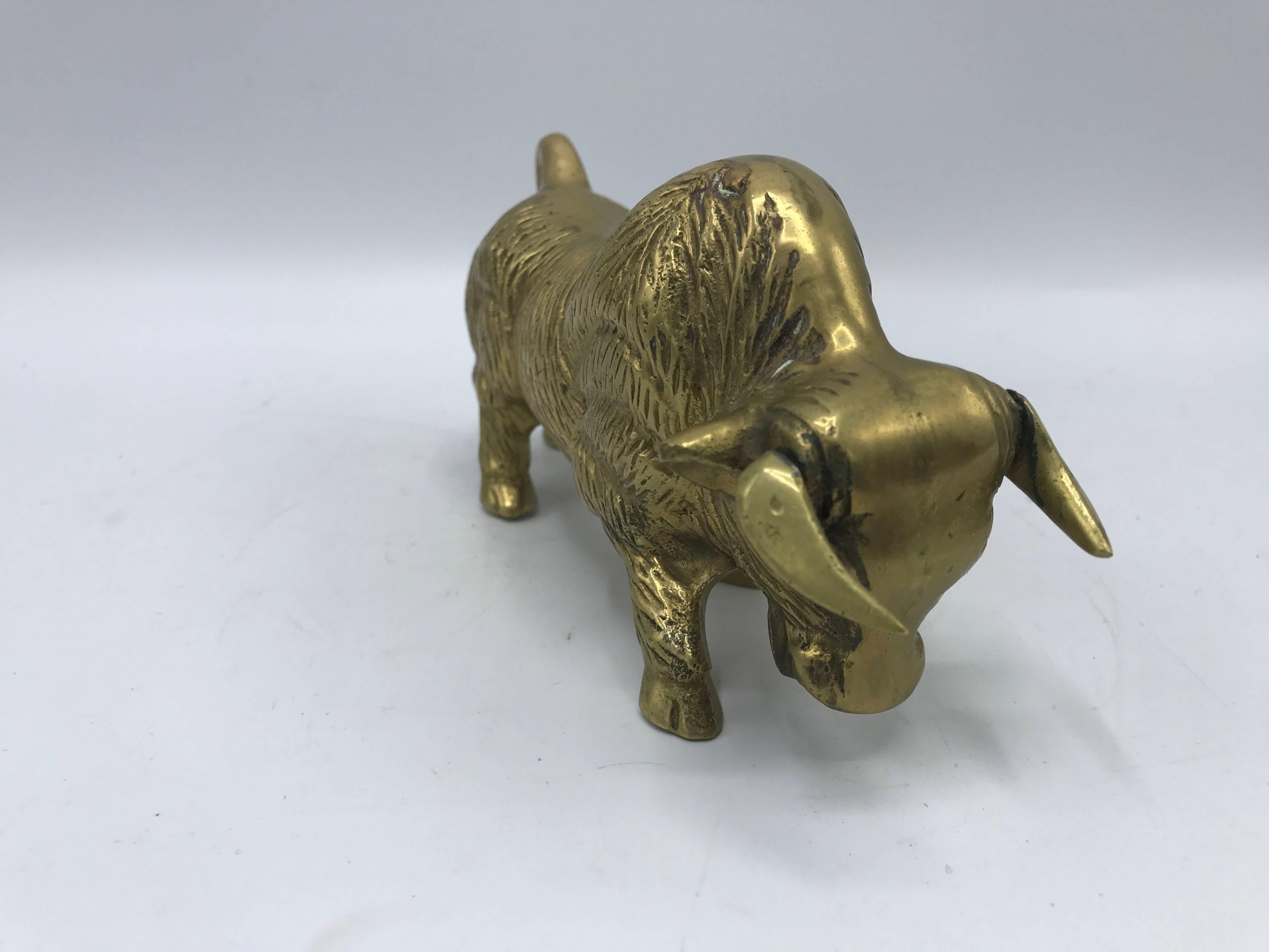 Offered is a beautiful, 1970s solid-brass bull sculpture. Heavy.