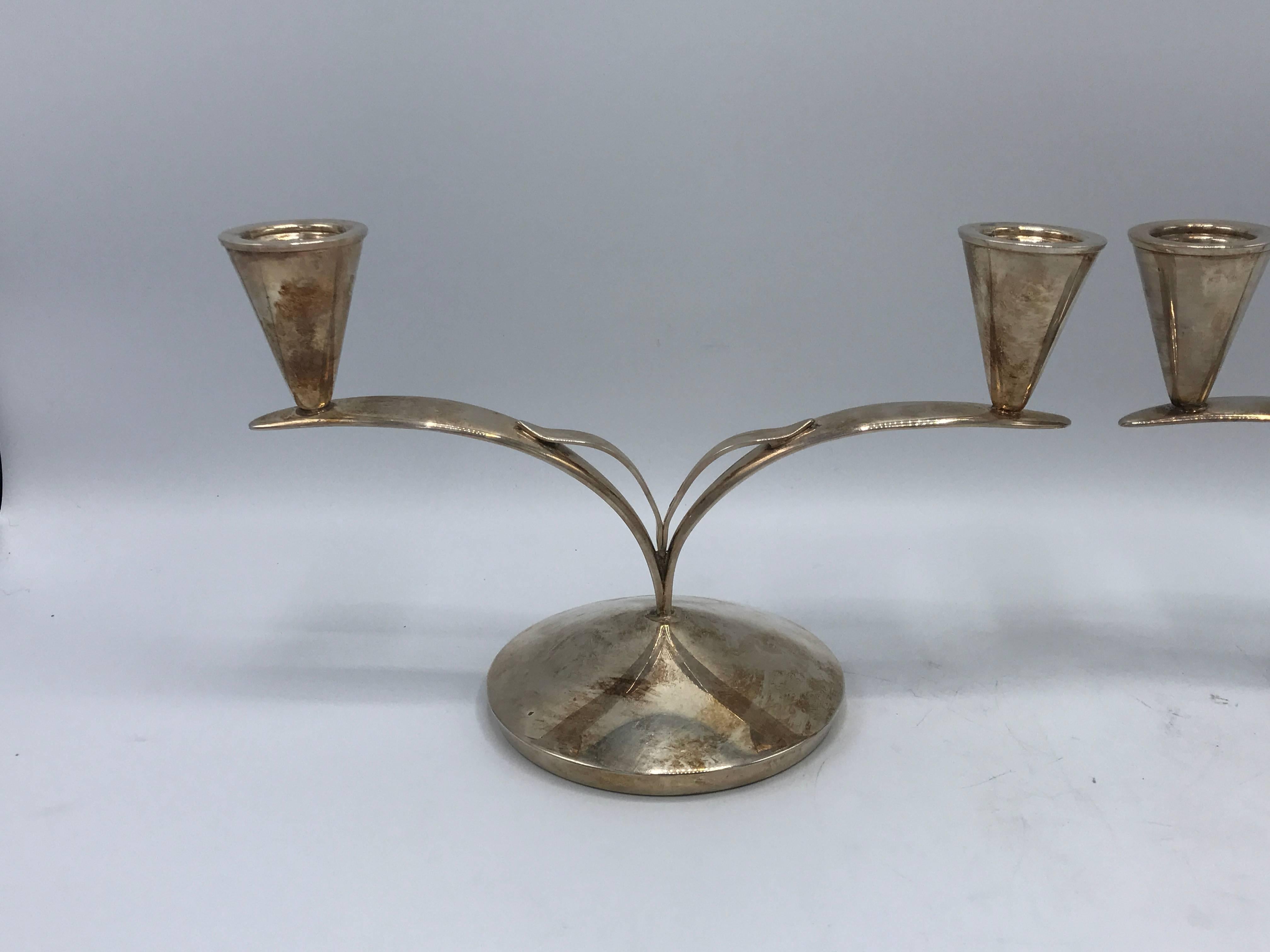 Offered is a stunning pair of 1960s Mid-Century Modern Danish silver plated candlestick holders. Marked: Denmark.